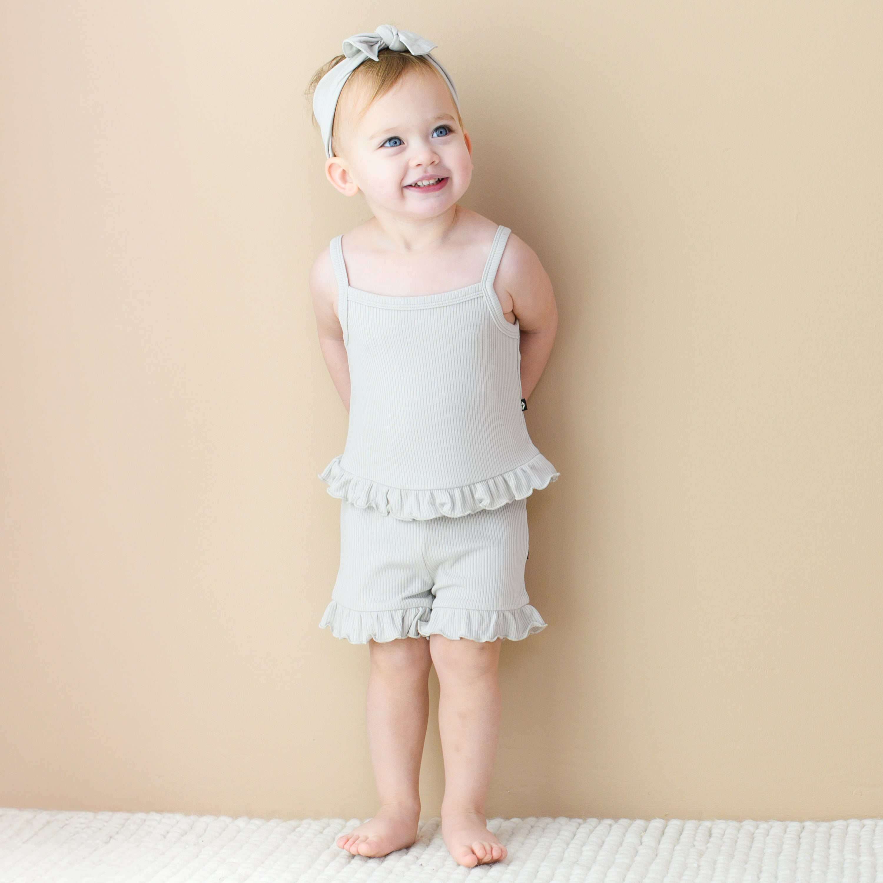 Toddler wearing Ribbed Ruffle Tank Set in Oat