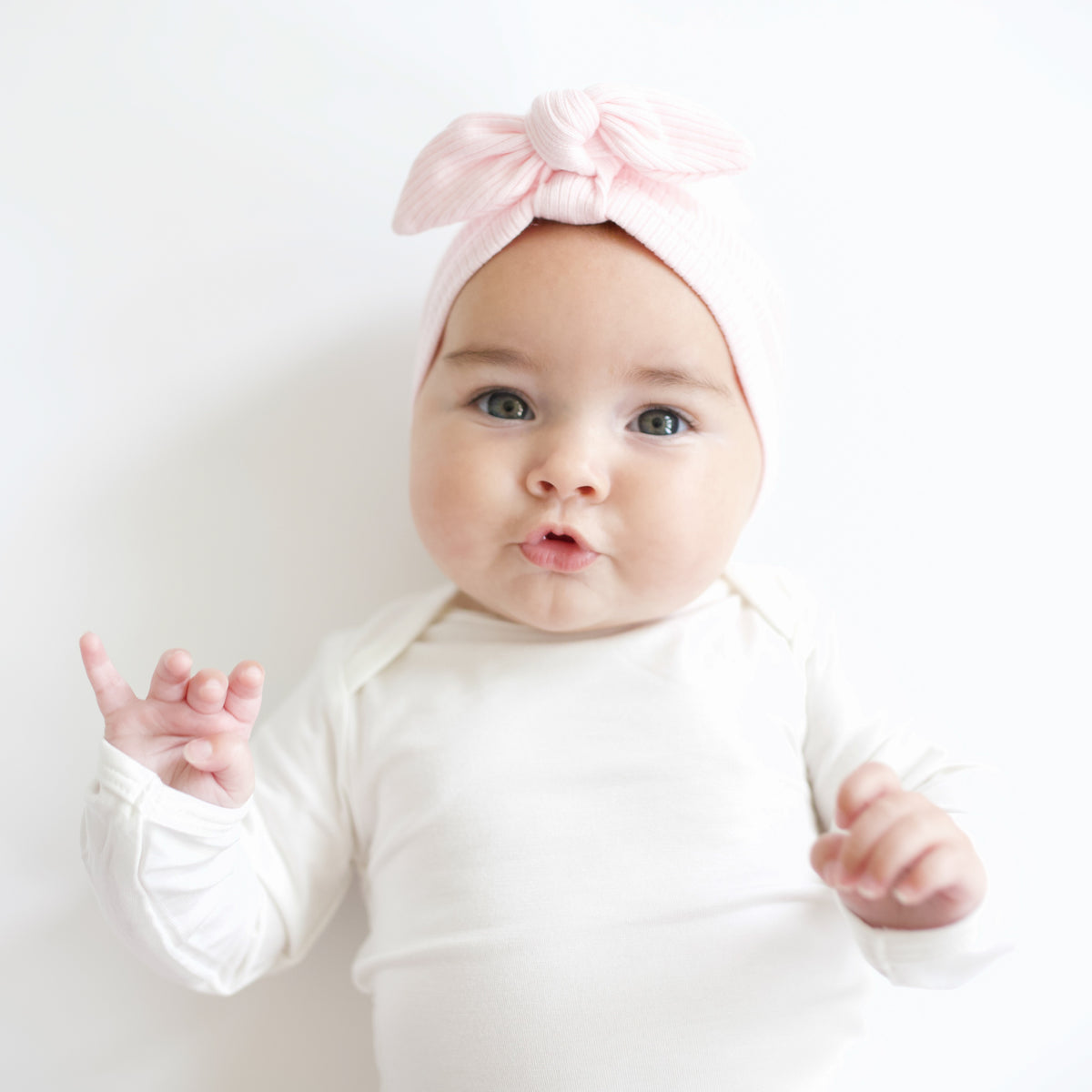 Baby wearing Ribbed Headwrap in Sakura