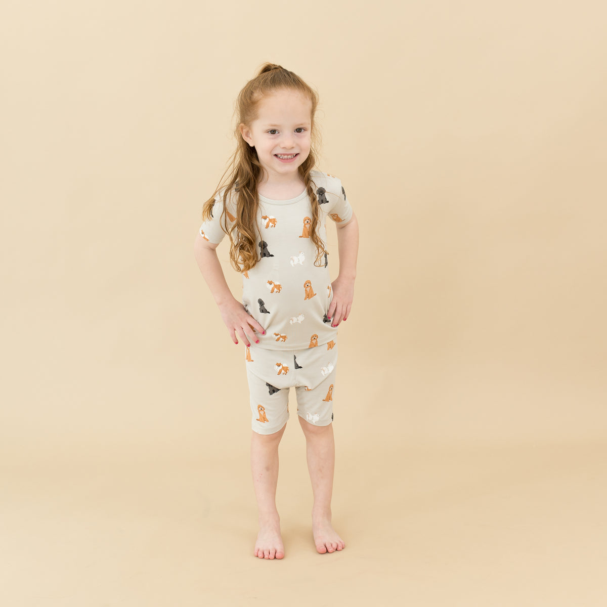 Child modeling Short Sleeve Pajamas in Fluffy Dog