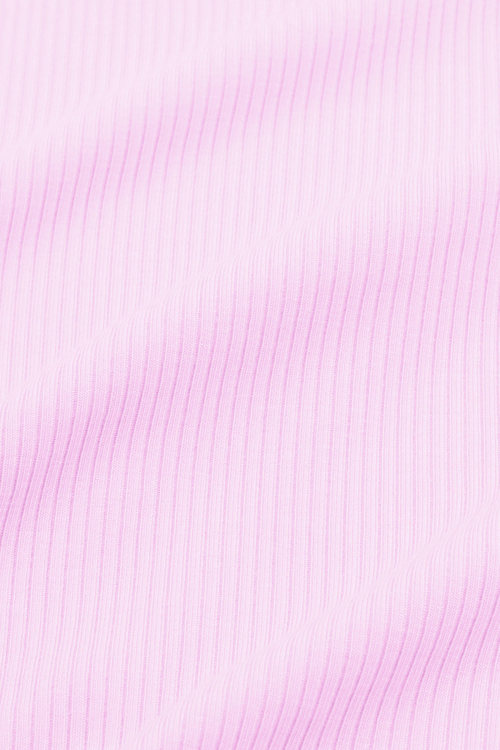 Close up of the ribbed fabric: A pinkish lilac