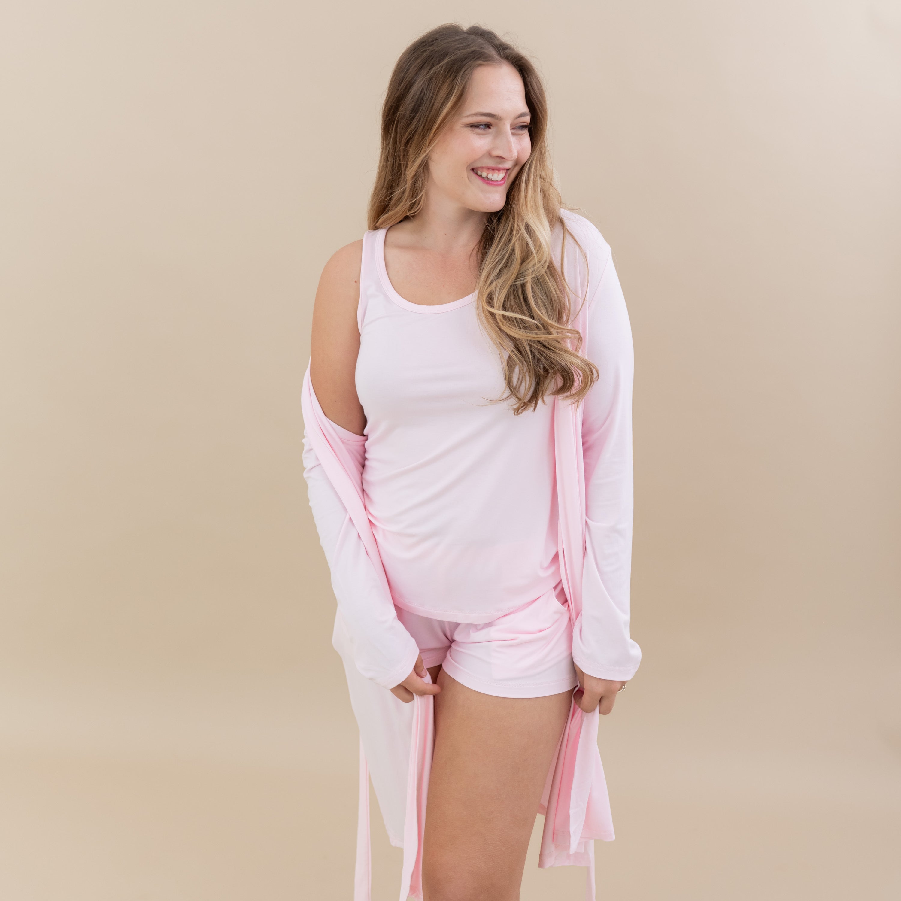 Woman modeling Women’s Lounge Robe in Sakura with matching tank set