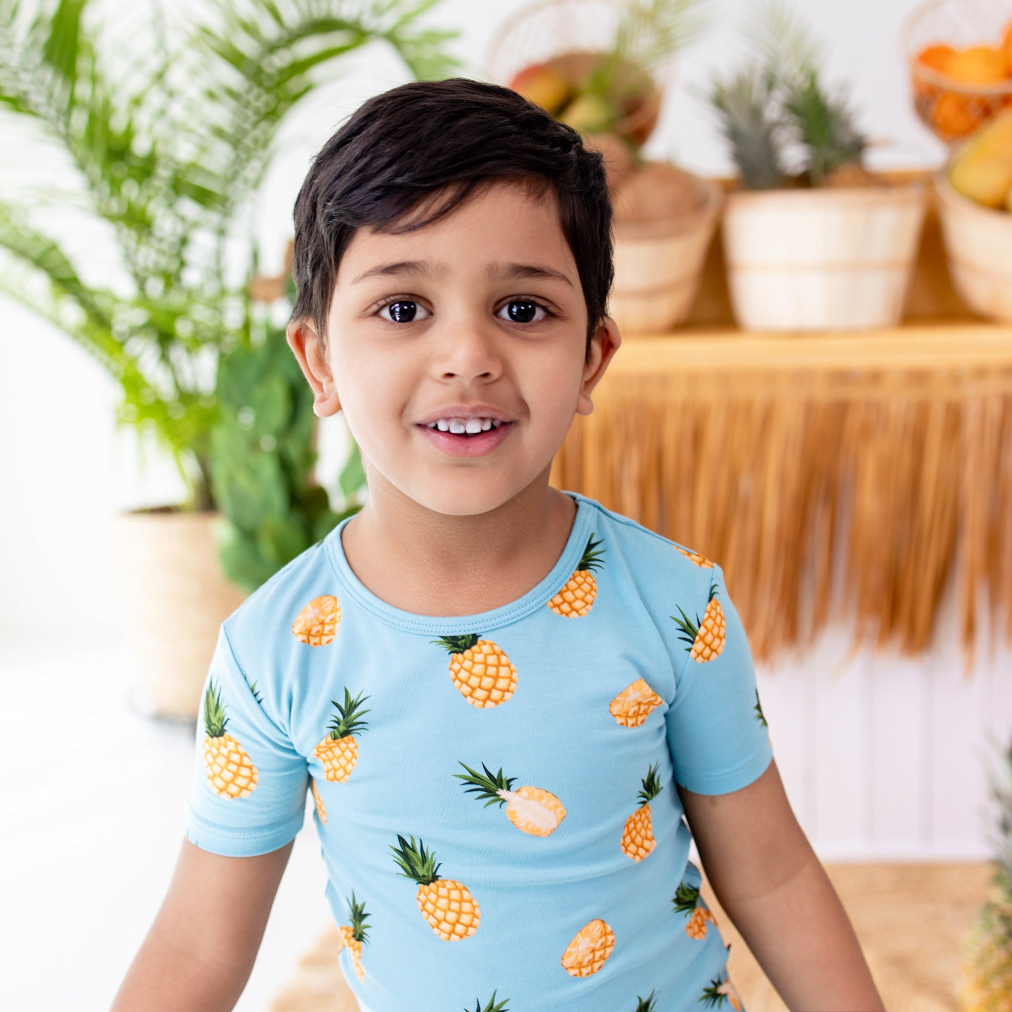 Toddler wearing Short Sleeve Kids Pajamas in Pineapple