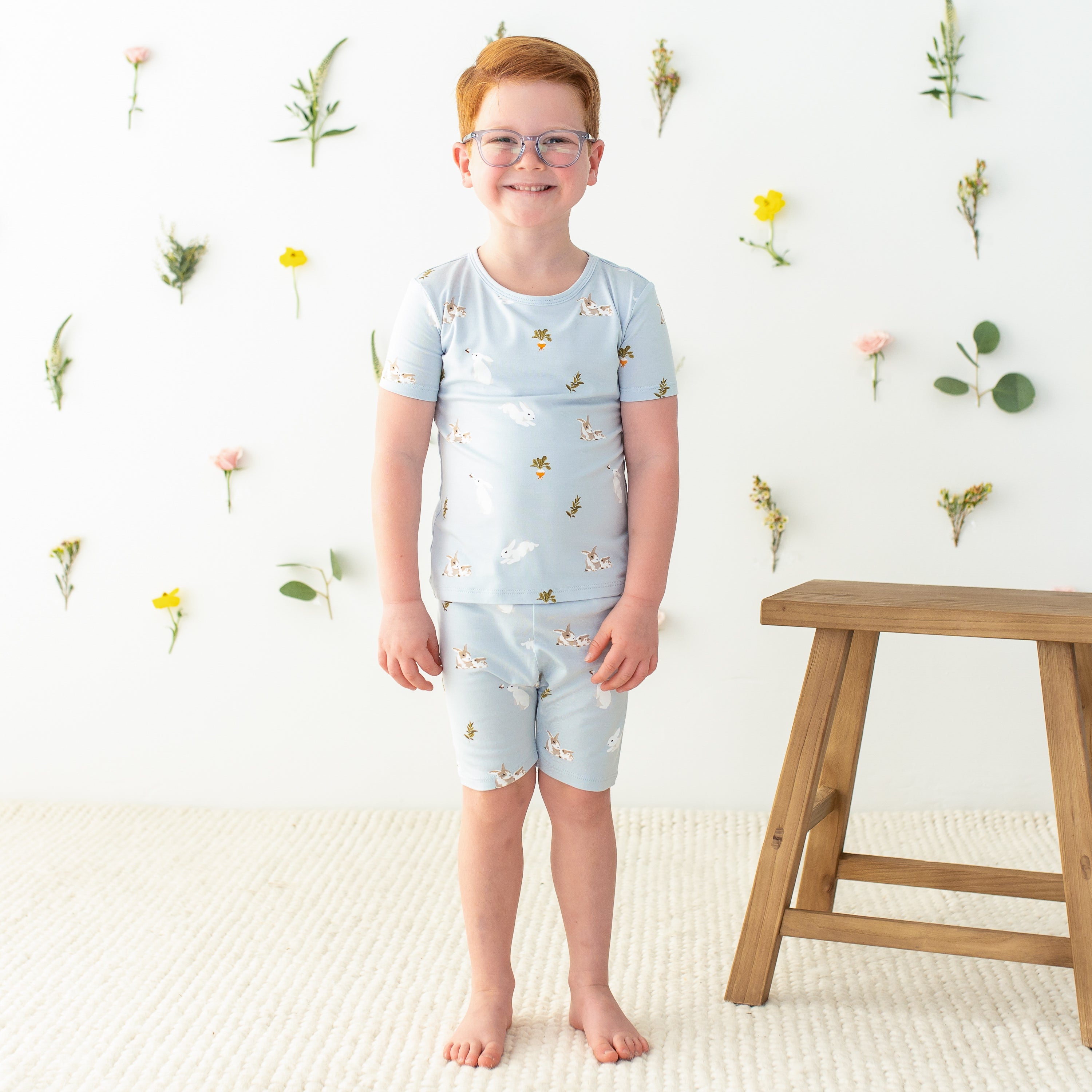 Child wearing Short Sleeve Blue Pajamas in Ice Rabbit