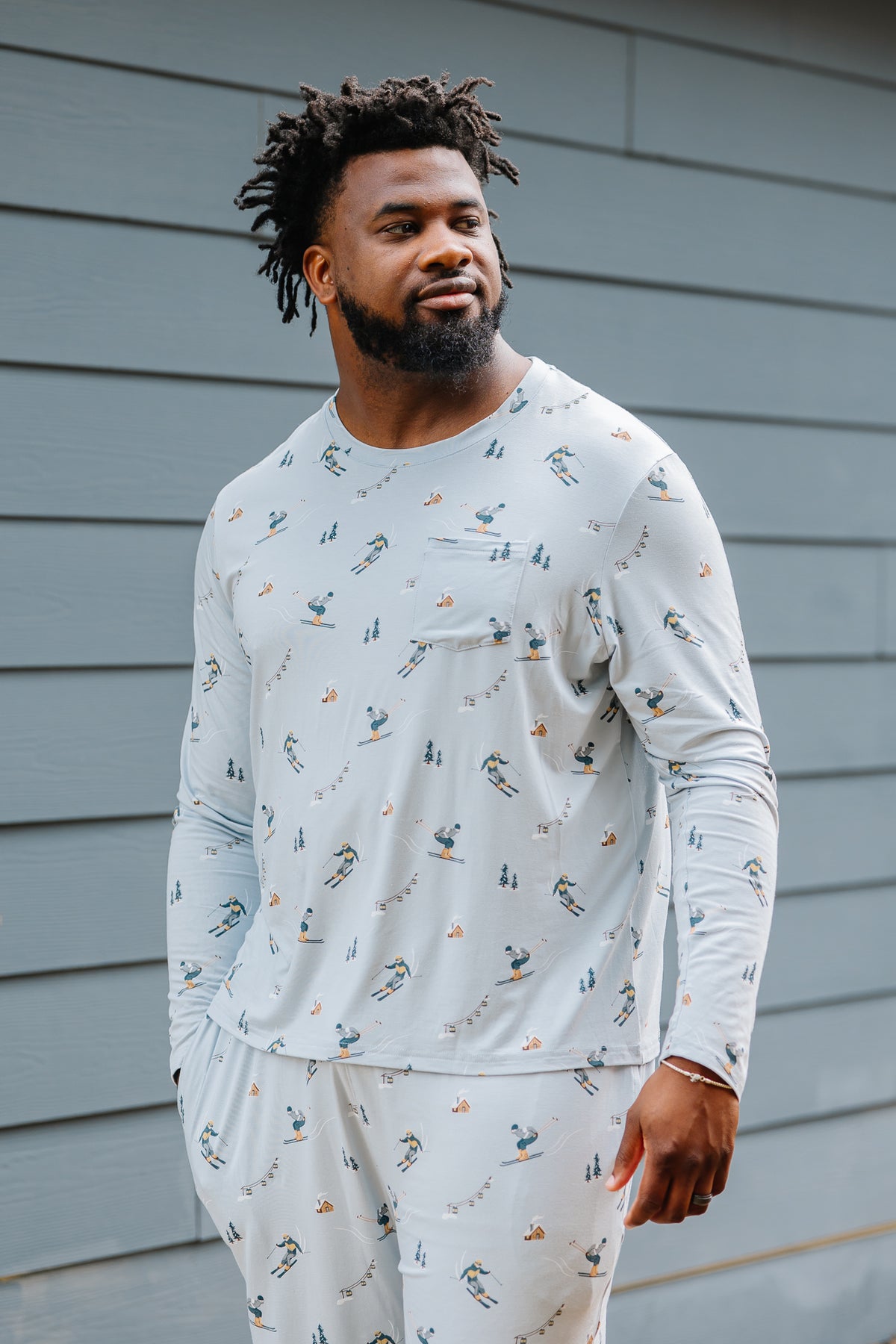 Close up of the shirt shown on a male model wearing the Men's Jogger Set in Ski