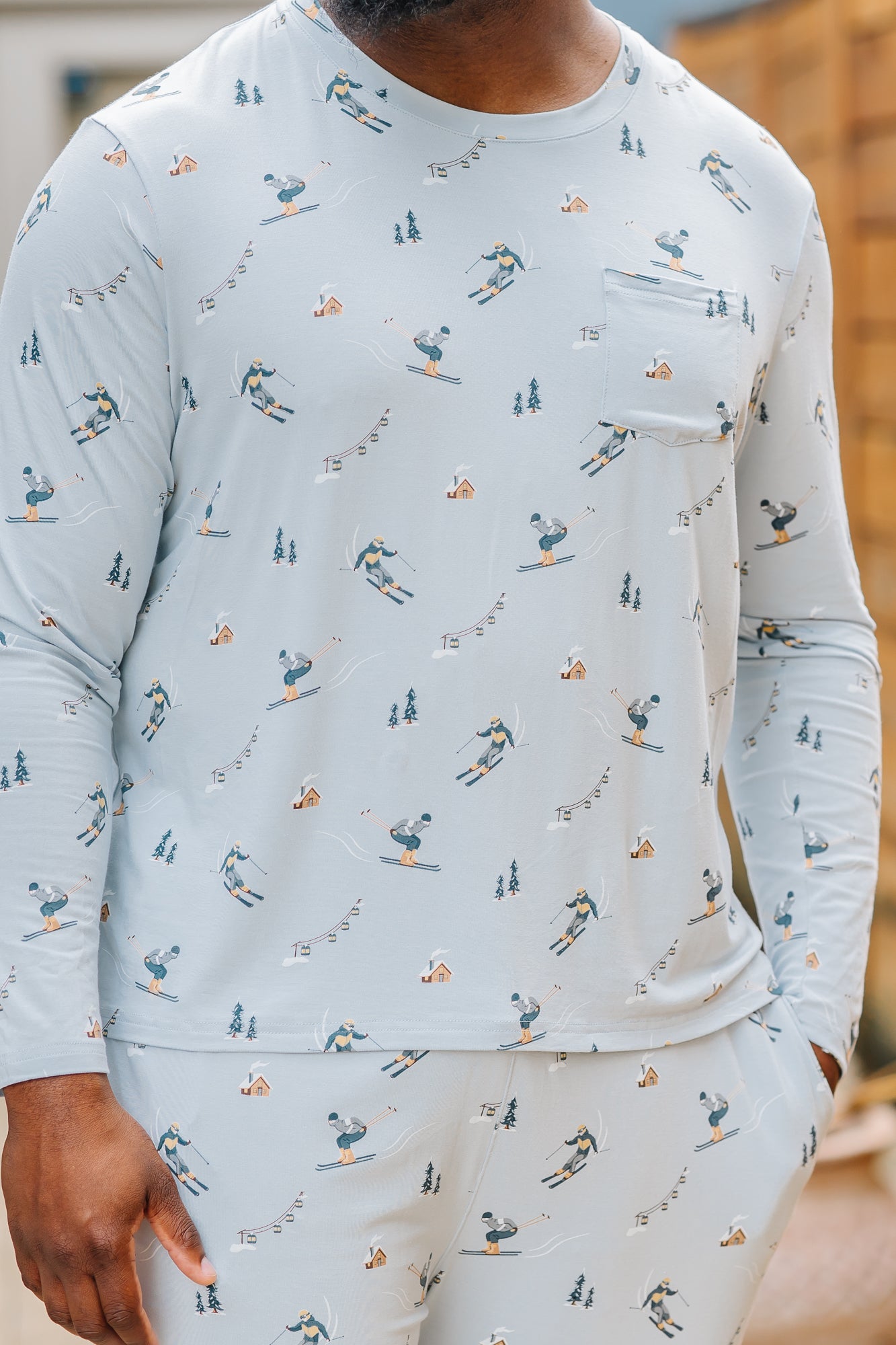 Close up of the Men's Jogger Set in Ski shirt shown on a male model