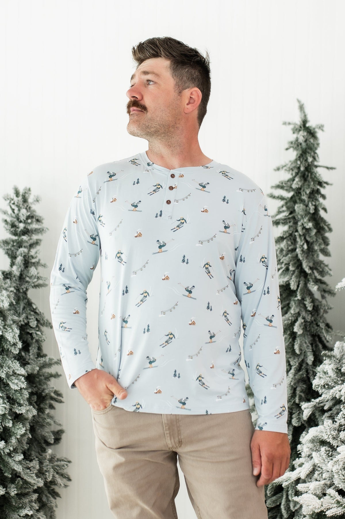 Male modeling the Men's Long Sleeve Henley Top in Ski