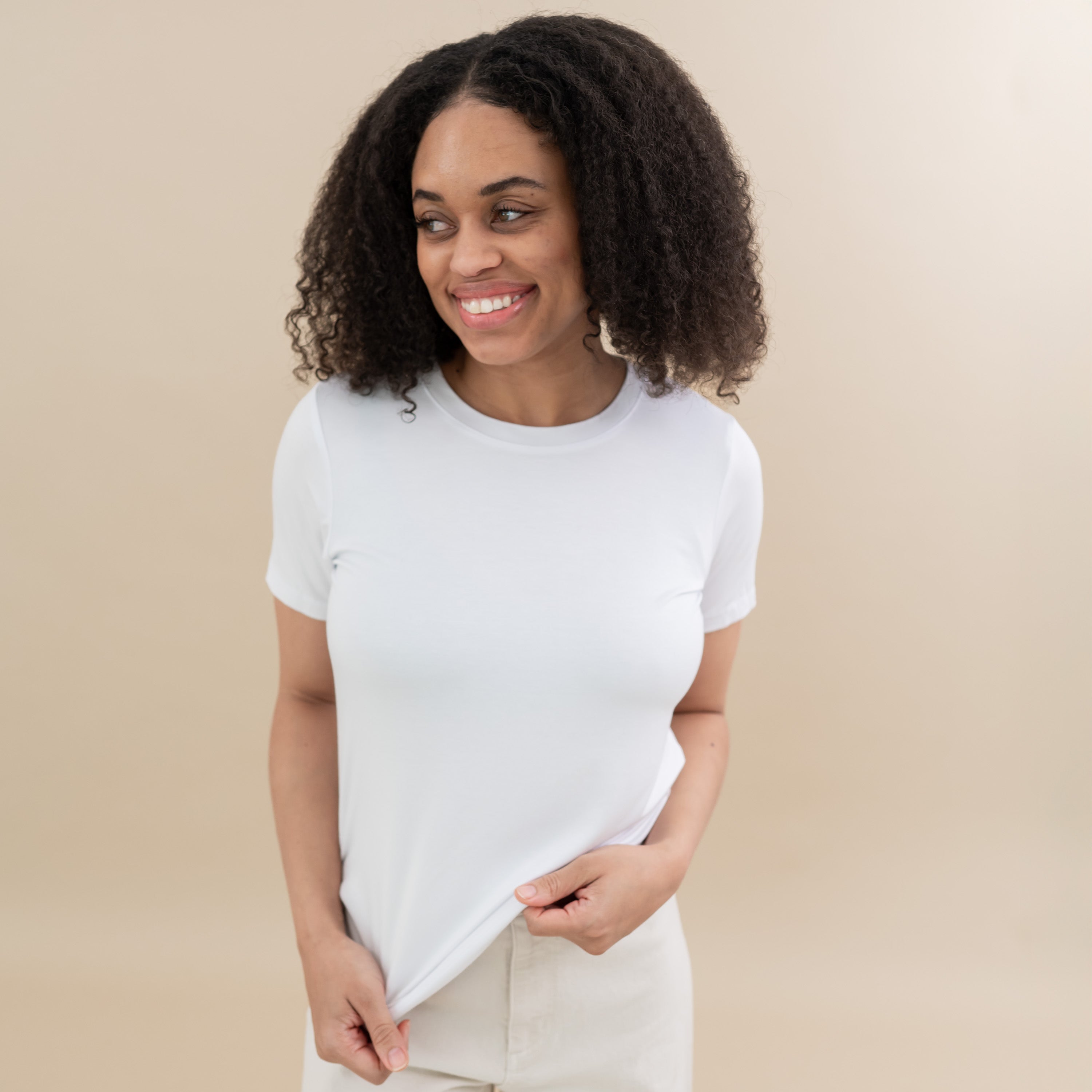 Woman wearing Women's Crew Neck Tee in Snow