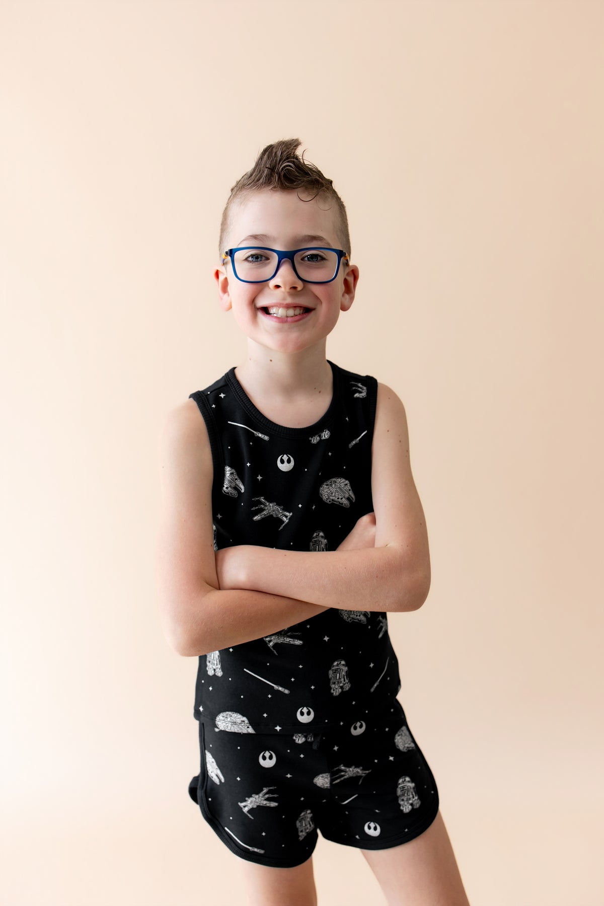 Close up of young boy modeling the Tank Jogger Set in STAR WARS™