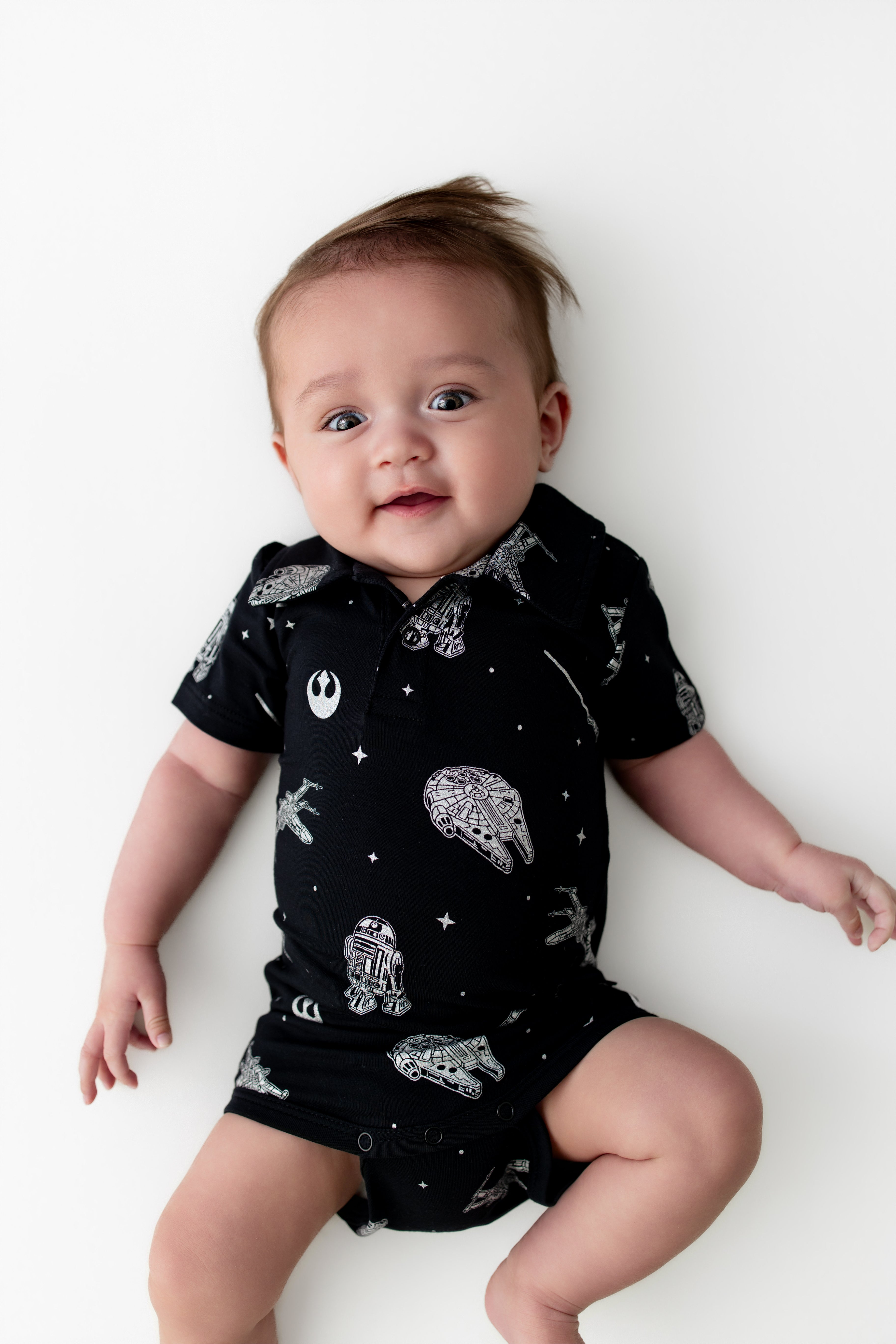 Close up of infant wearing the Polo Bodysuit in STAR WARS™
