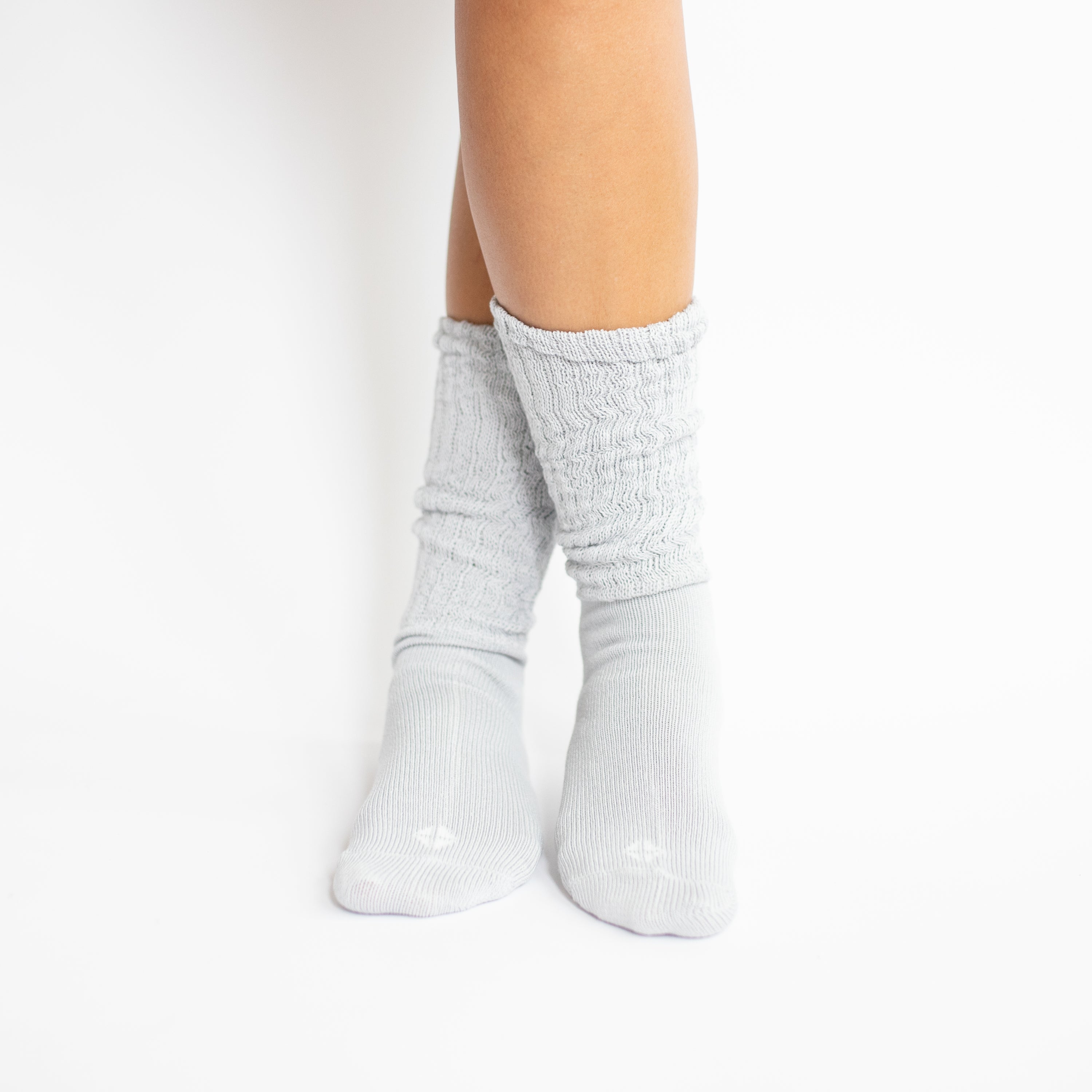 Adult Scrunch Socks in Storm shown on a model