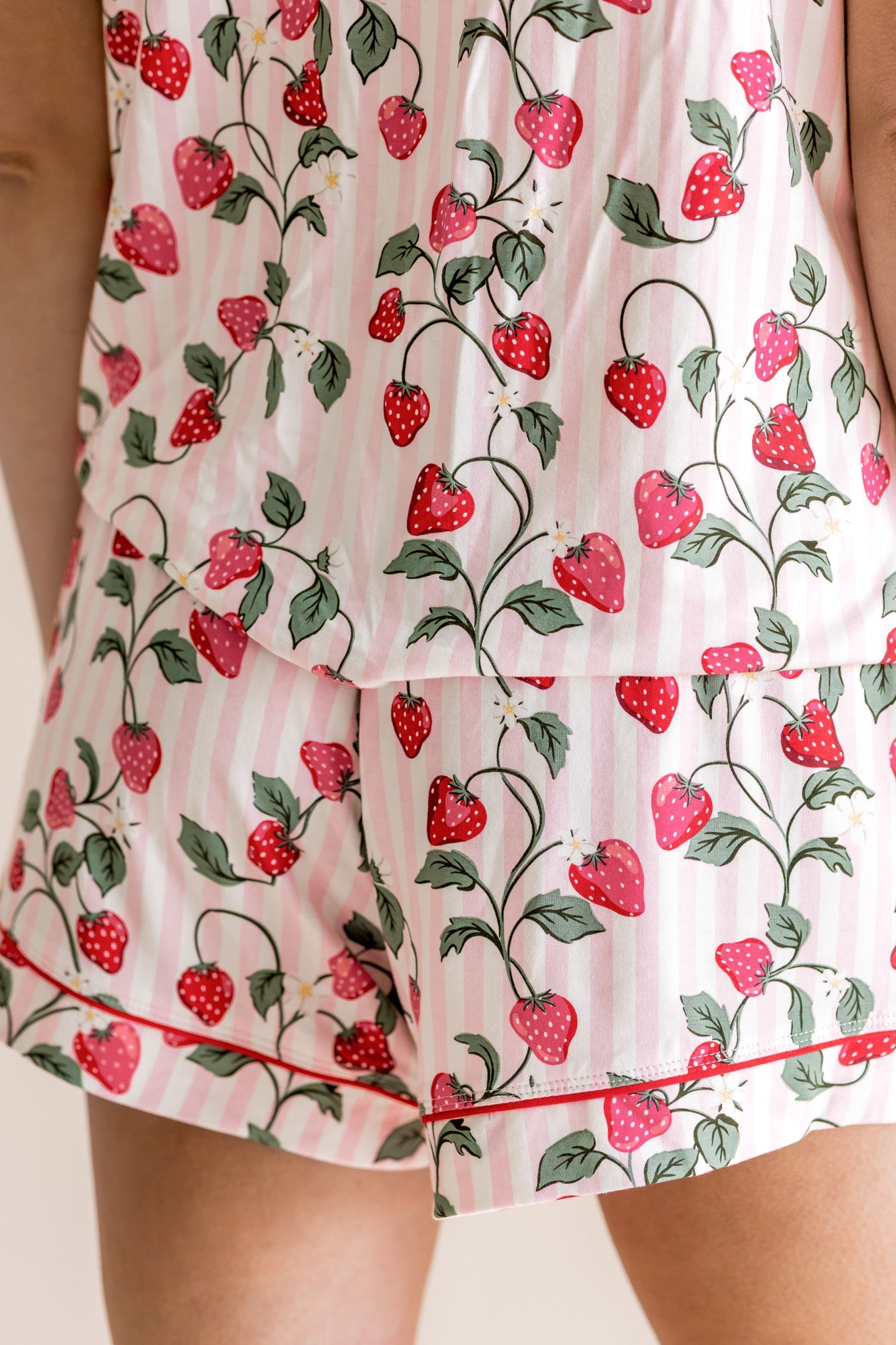 Pajama set with strawberry pattern on a white background
