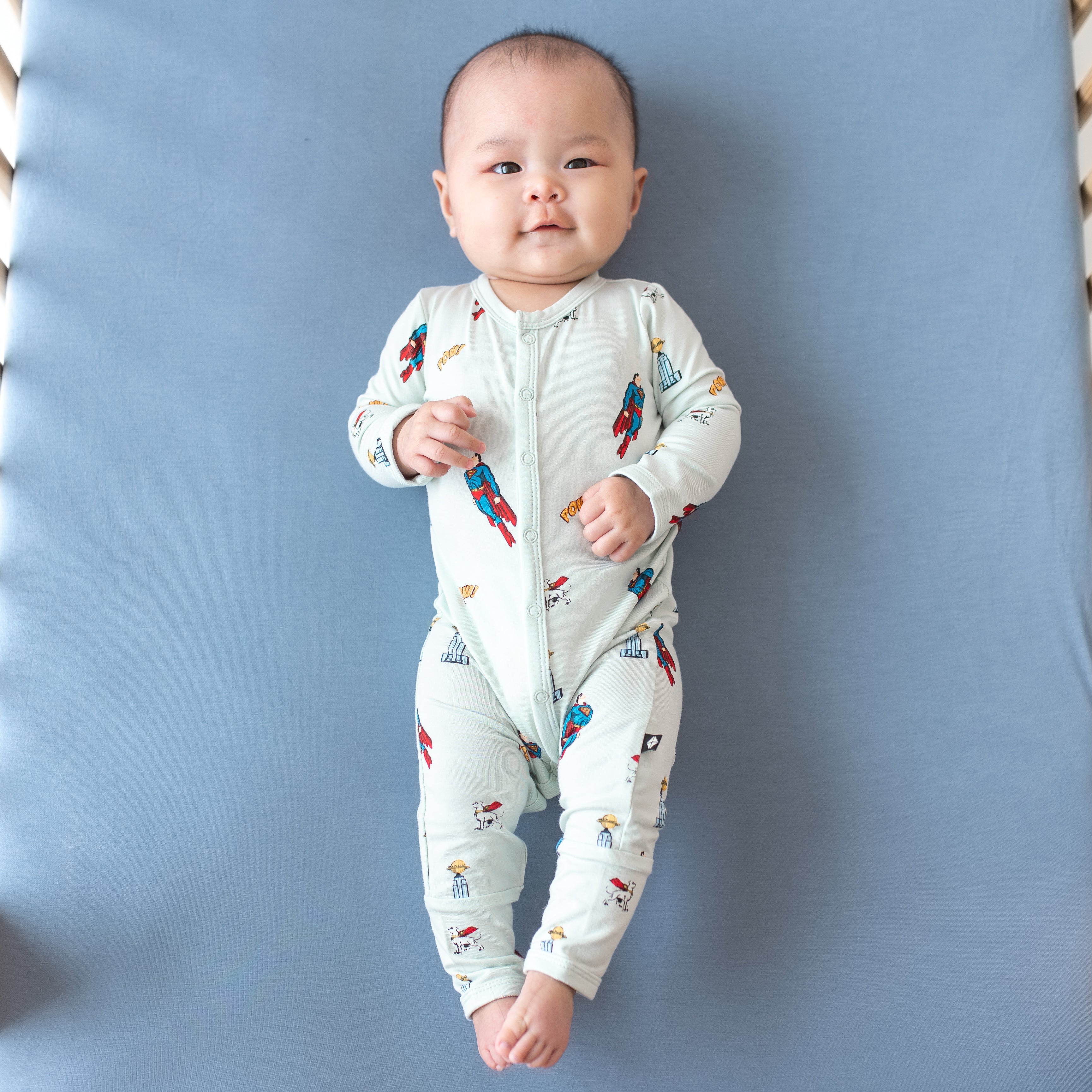 Baby wearing snap Romper in Superman™