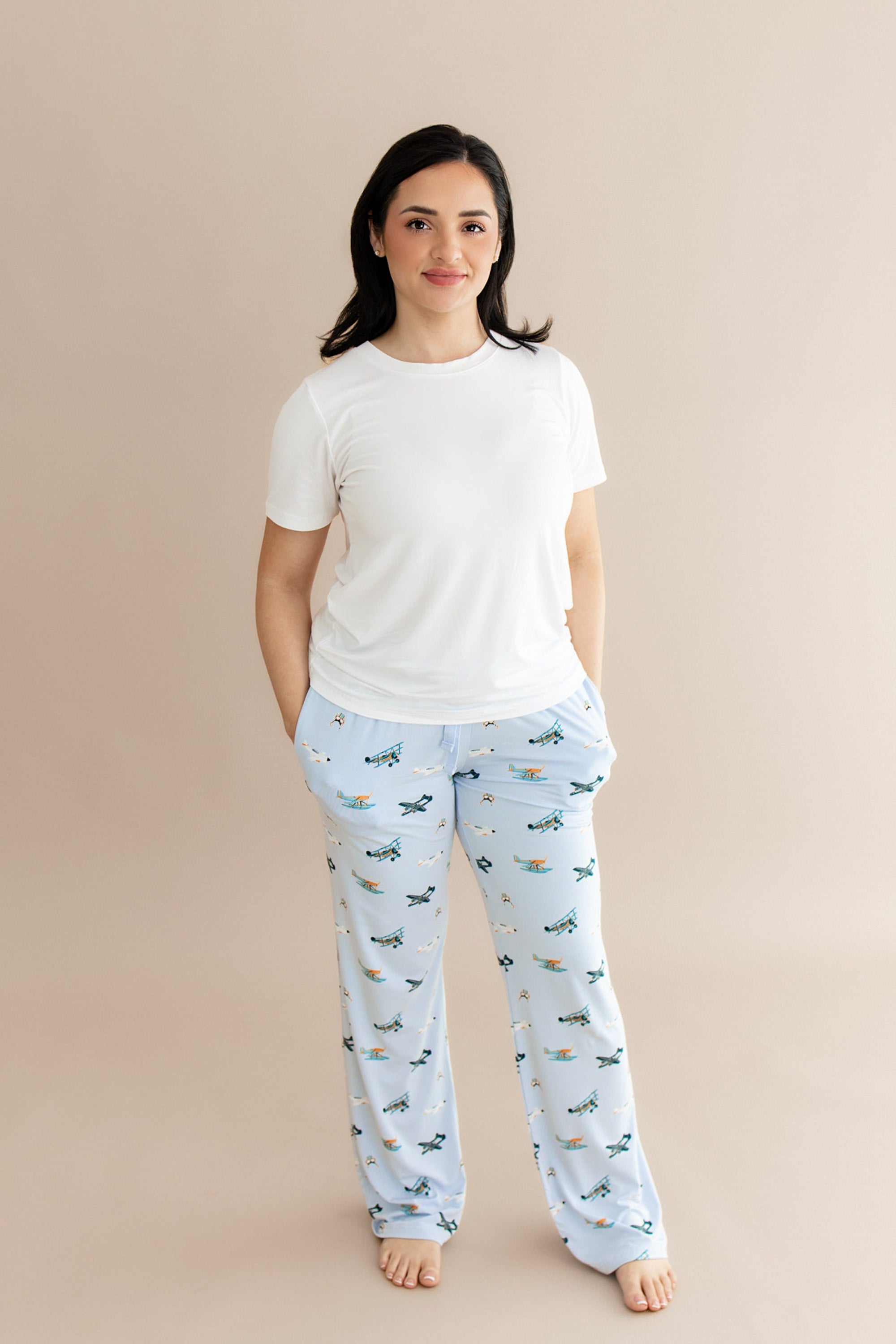Female modeling the Women's Lounge Pants in Take Off with a white shirt