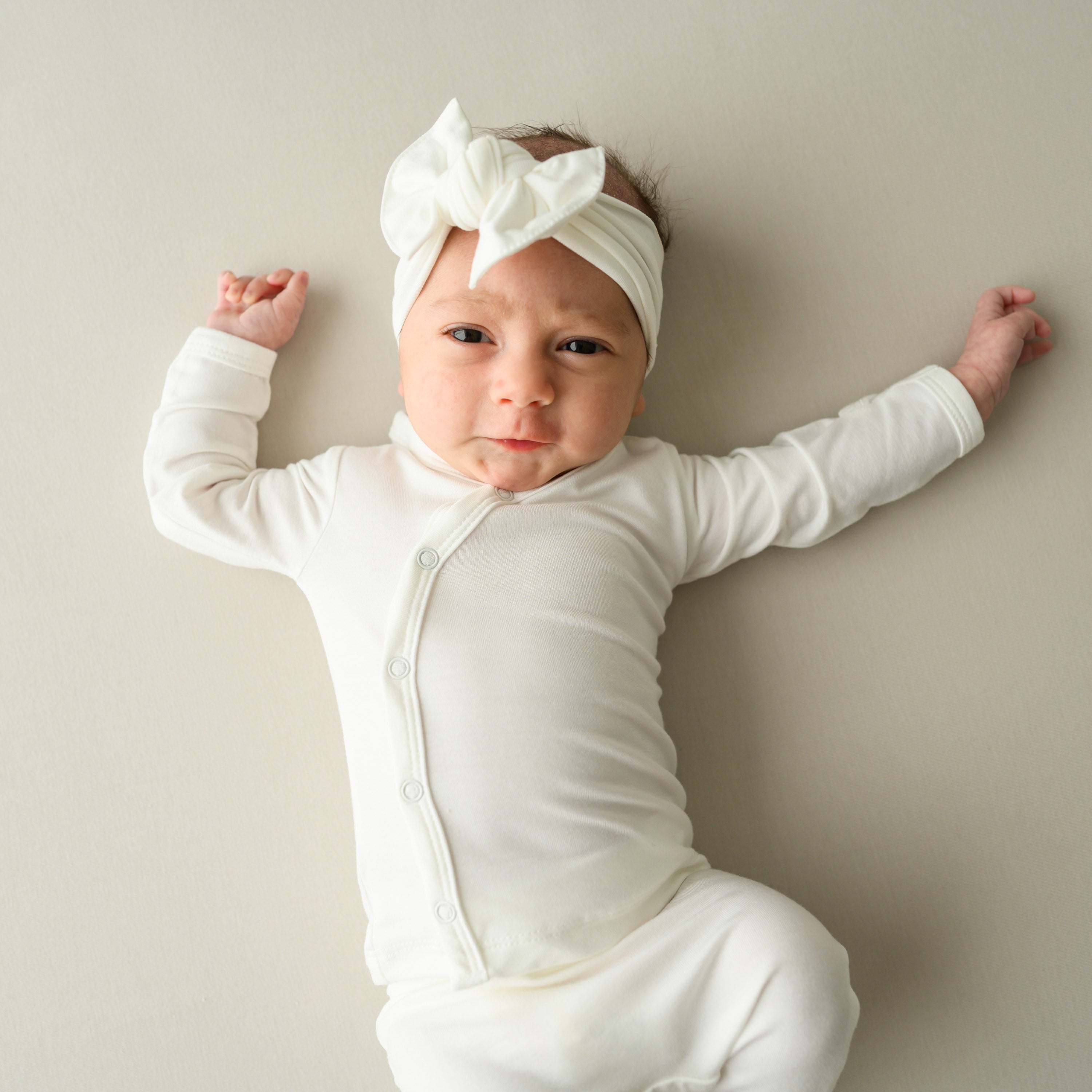 Newborn wearing Bamboo Take Me Home Hospital Set with Bow in Cloud