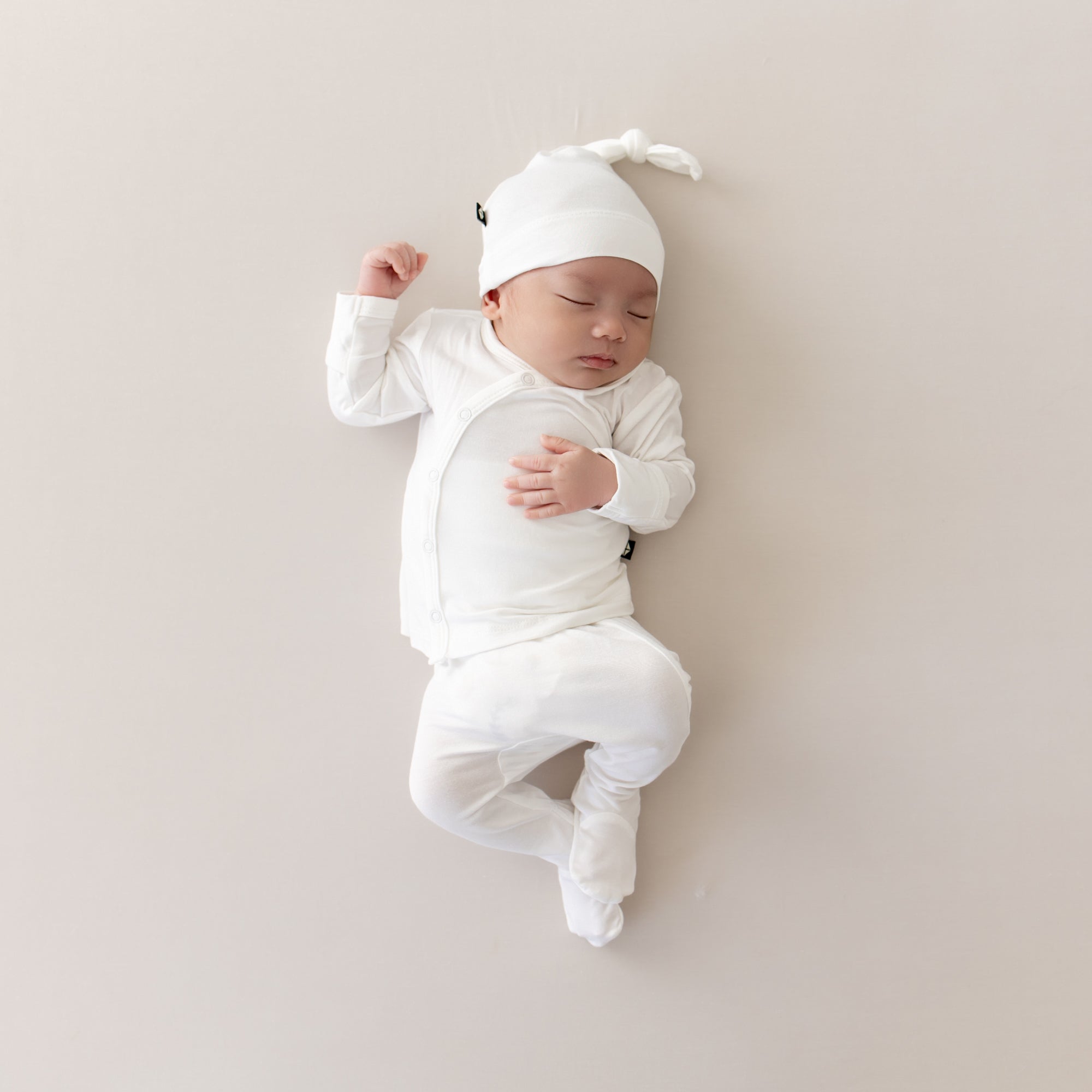 Baby wearing Take Me Home Set with Cap in Cloud White