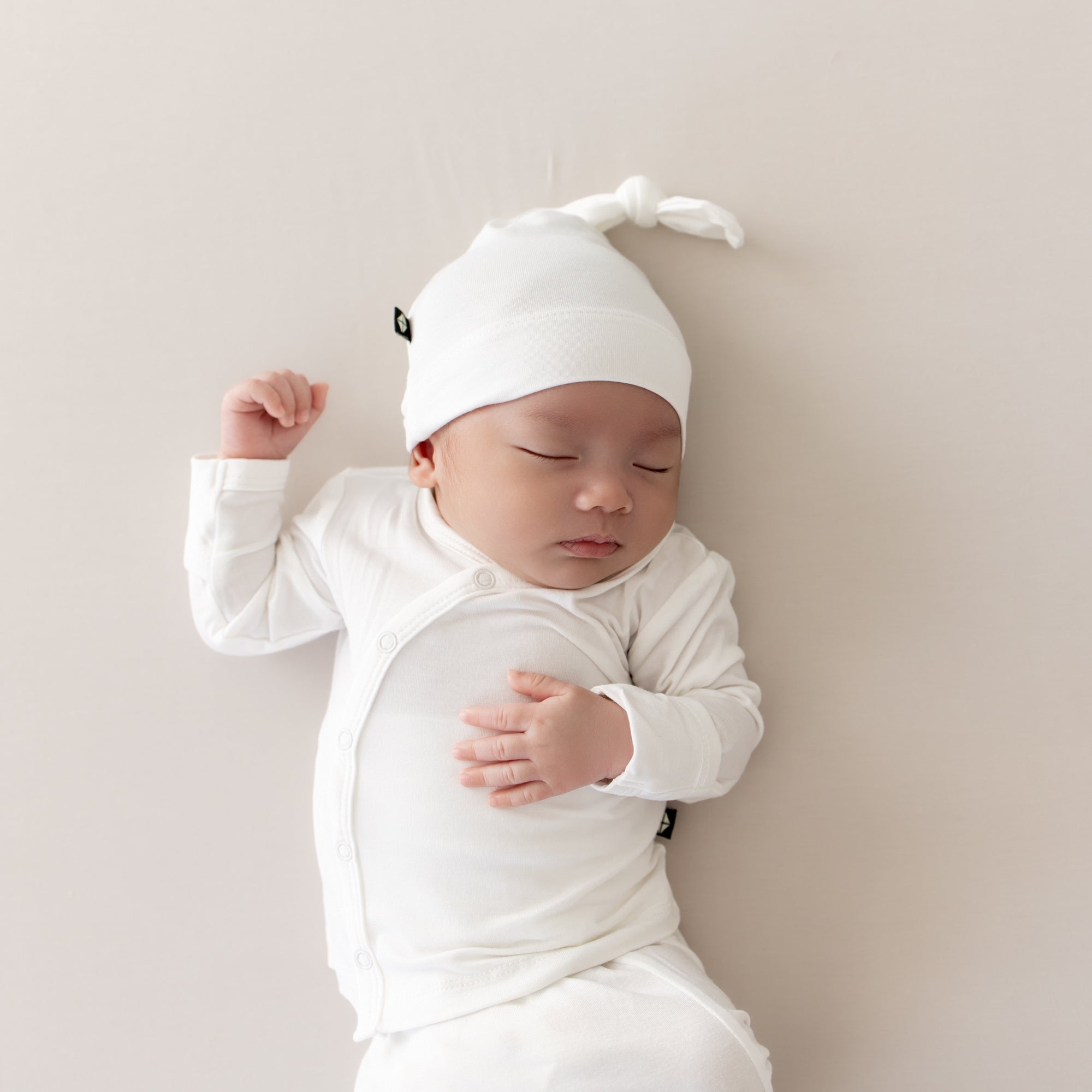 Sleeping Newborn in Take Me Home Set with Cap in Cloud