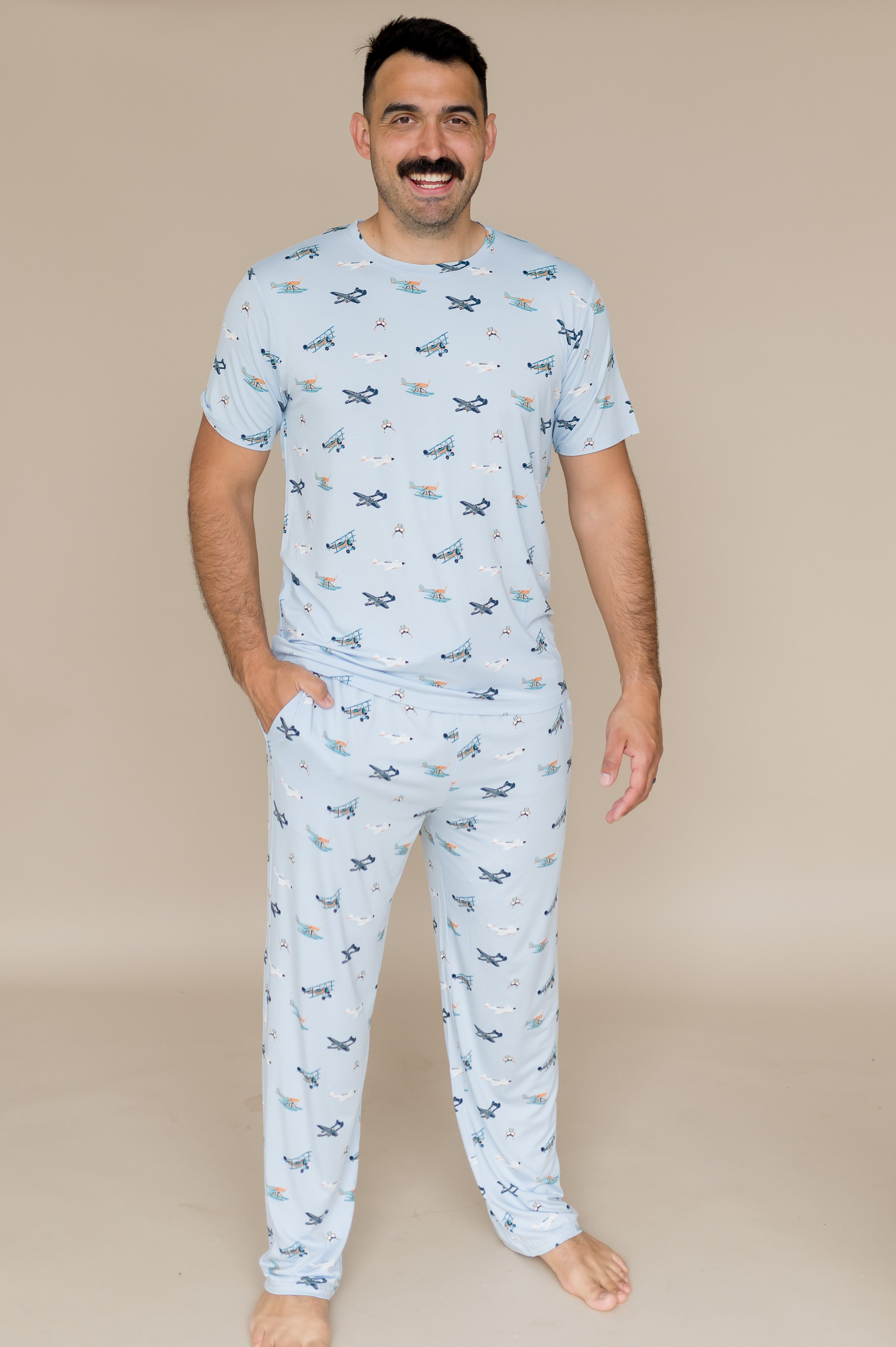 Mae modeling the Men's Crew Neck Tee in Take Off paired with Men's Lounge pants in Take off