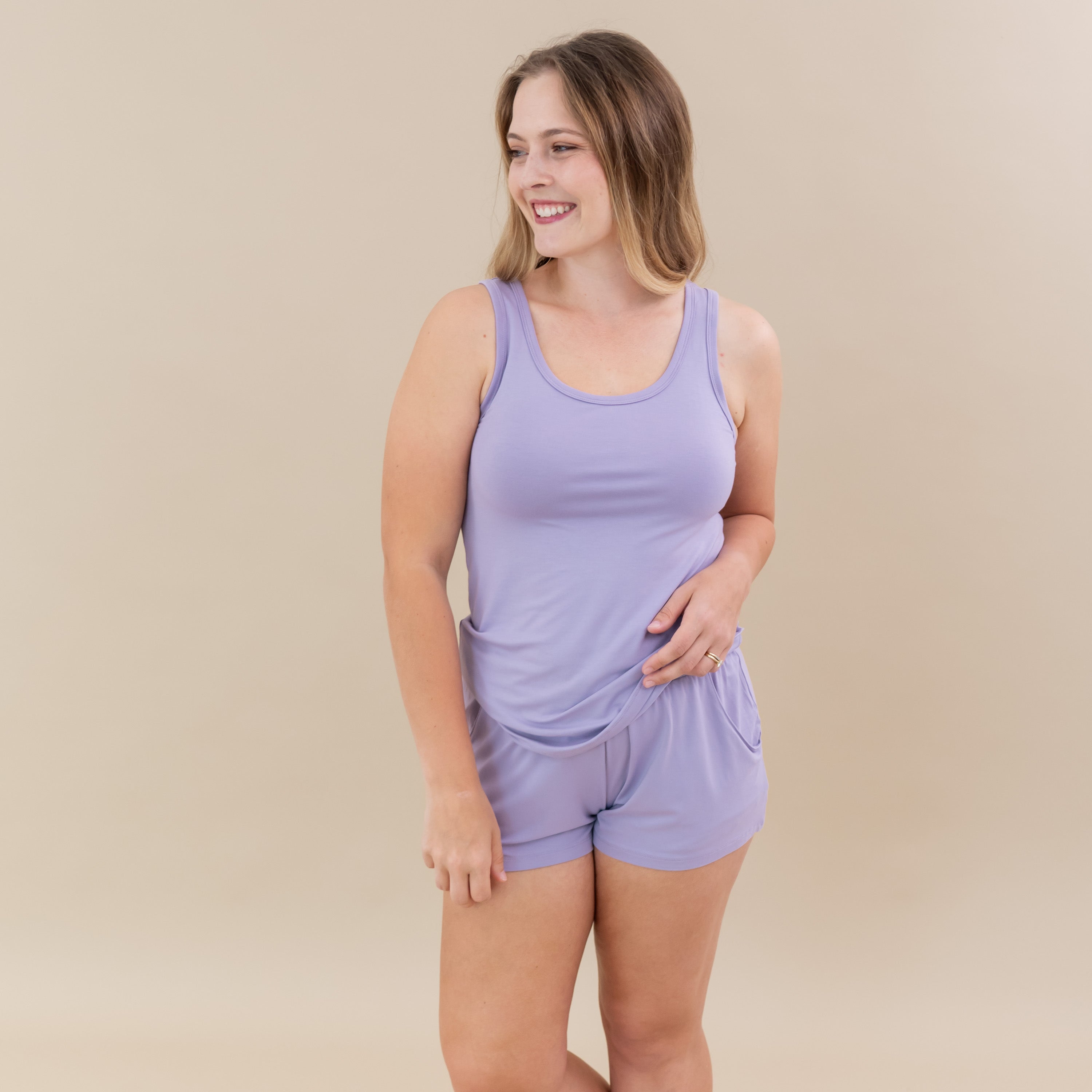 Woman modeling Women’s Tank Set in Taro