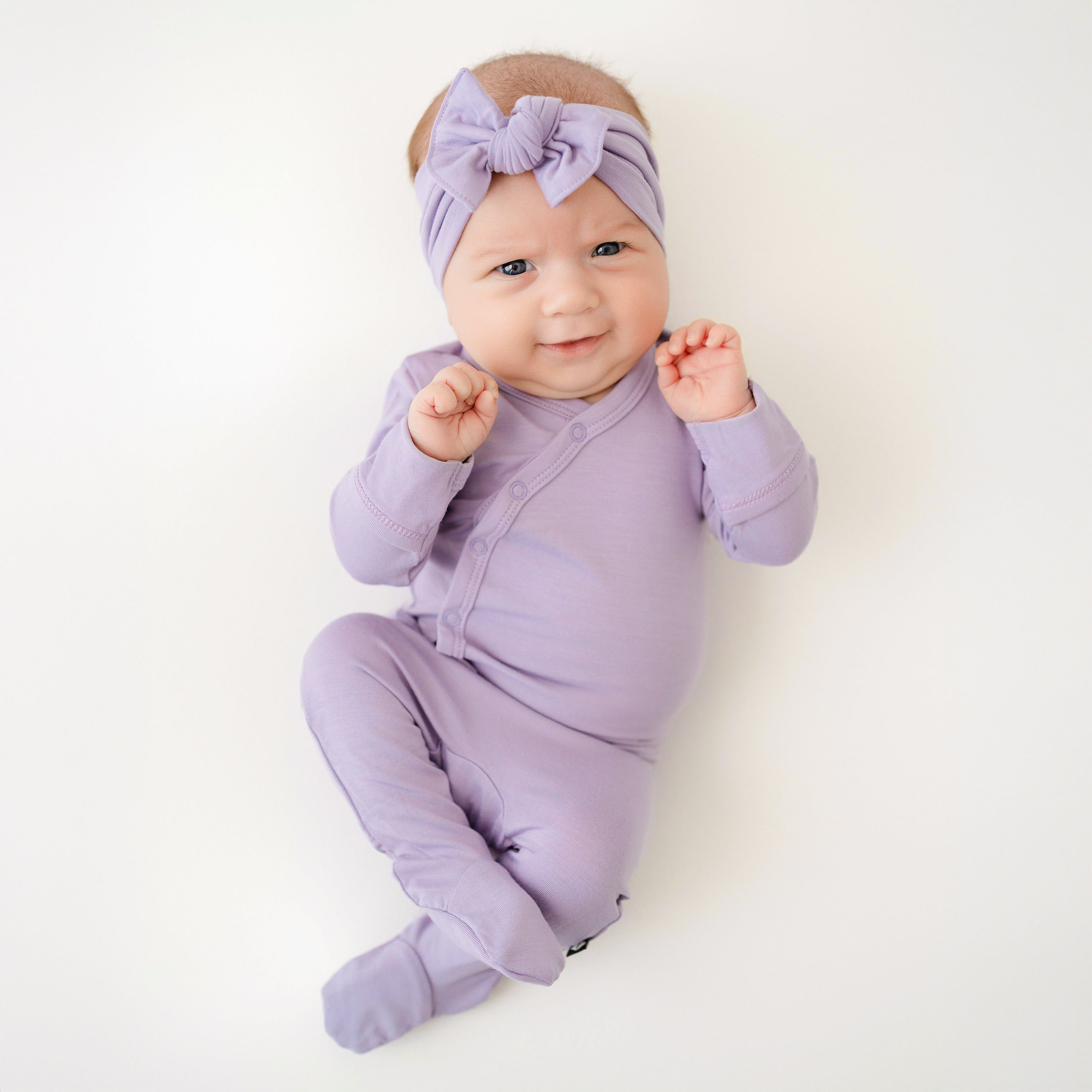 Baby wearing Purple Take Me Home Hospital Set with Bow in Taro