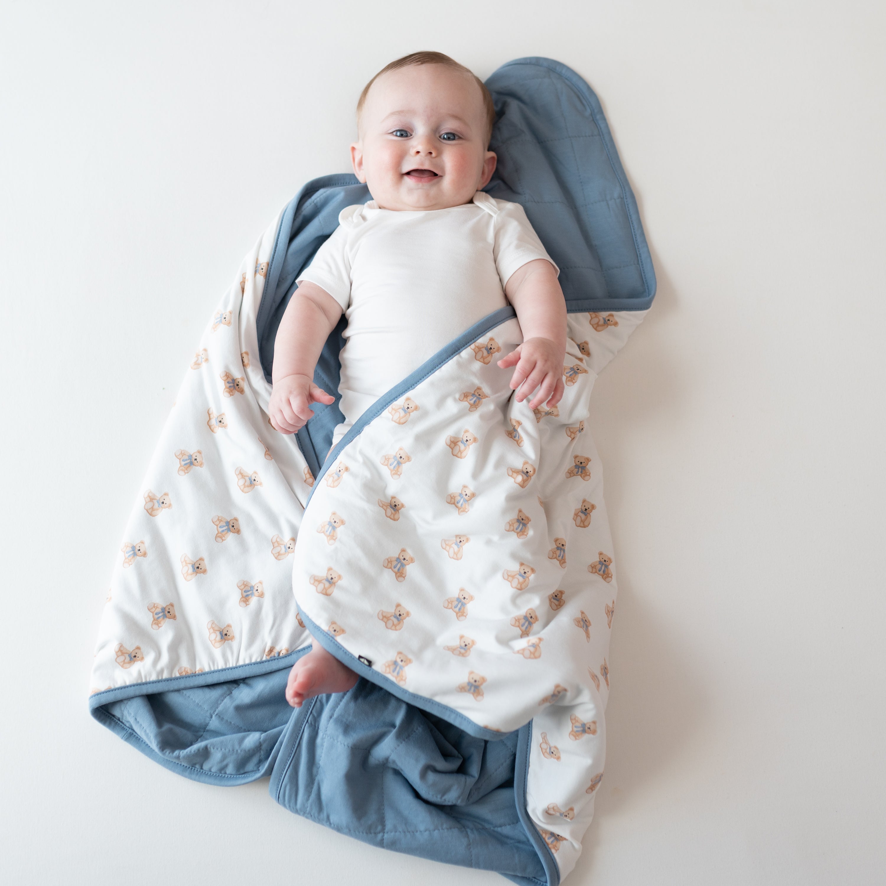 Baby laying on Baby Blanket in Teddy Bear 1.0