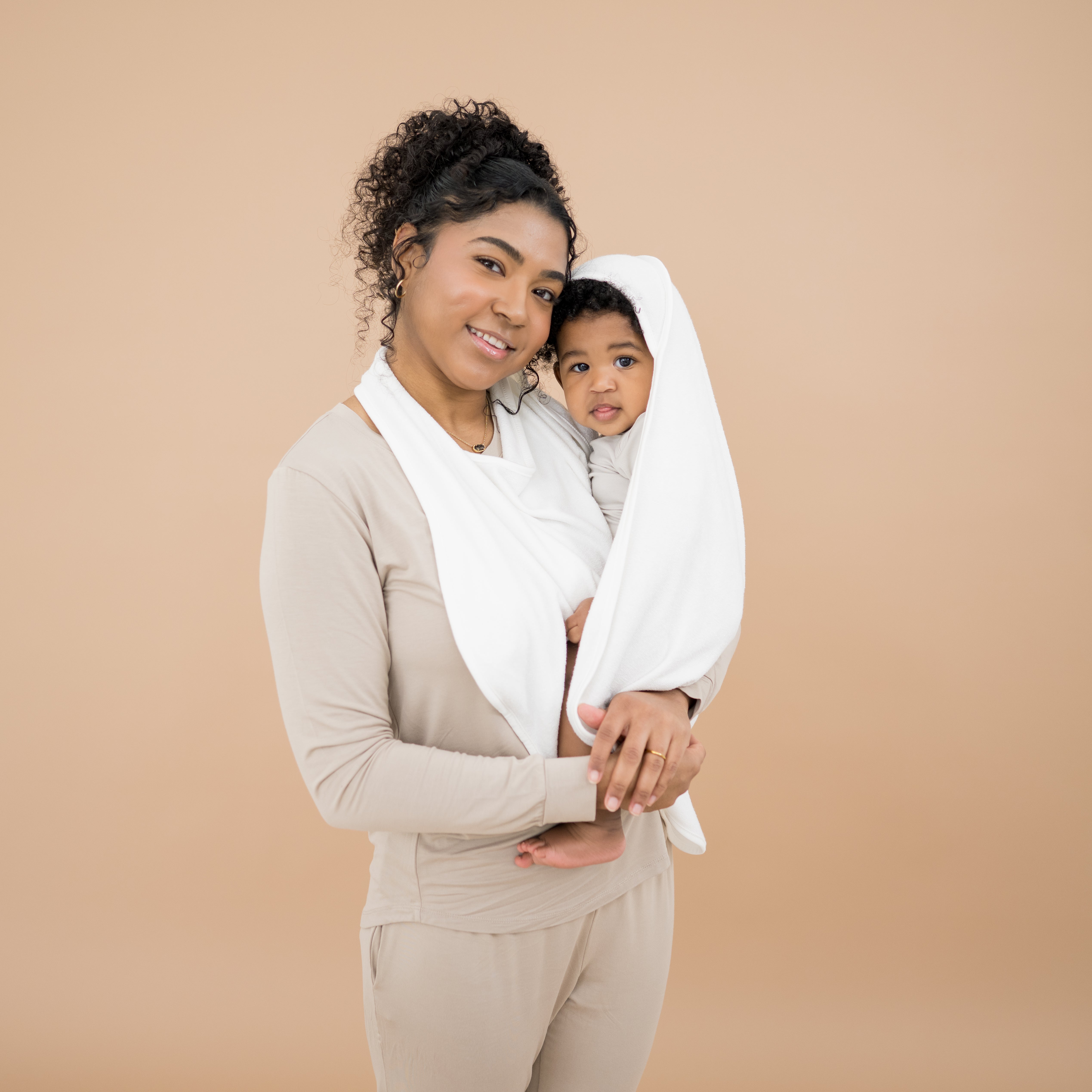 Mom and baby wrapped in Terry Apron Towel in Cloud white