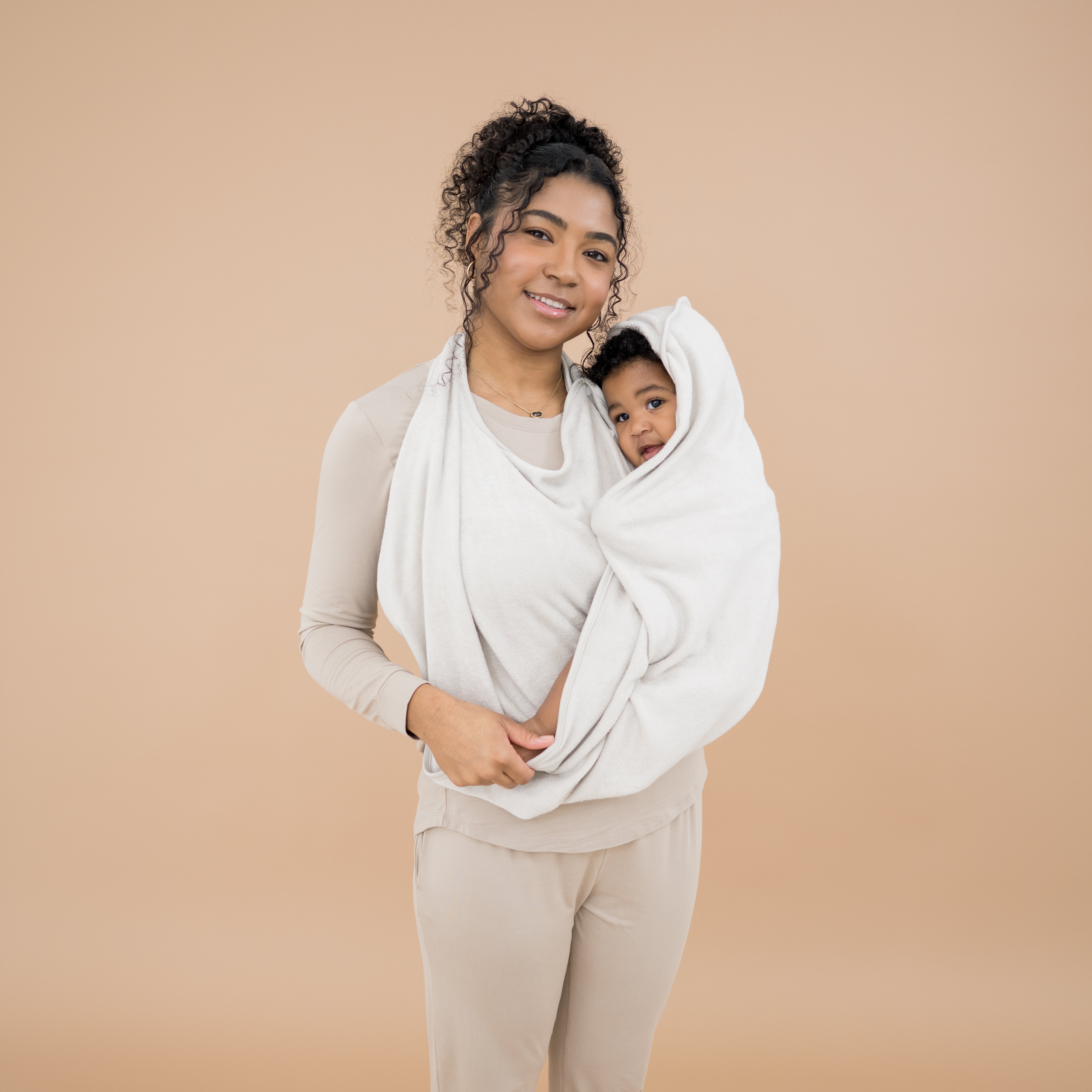 Mom and baby using Terry Apron Towel in Oat