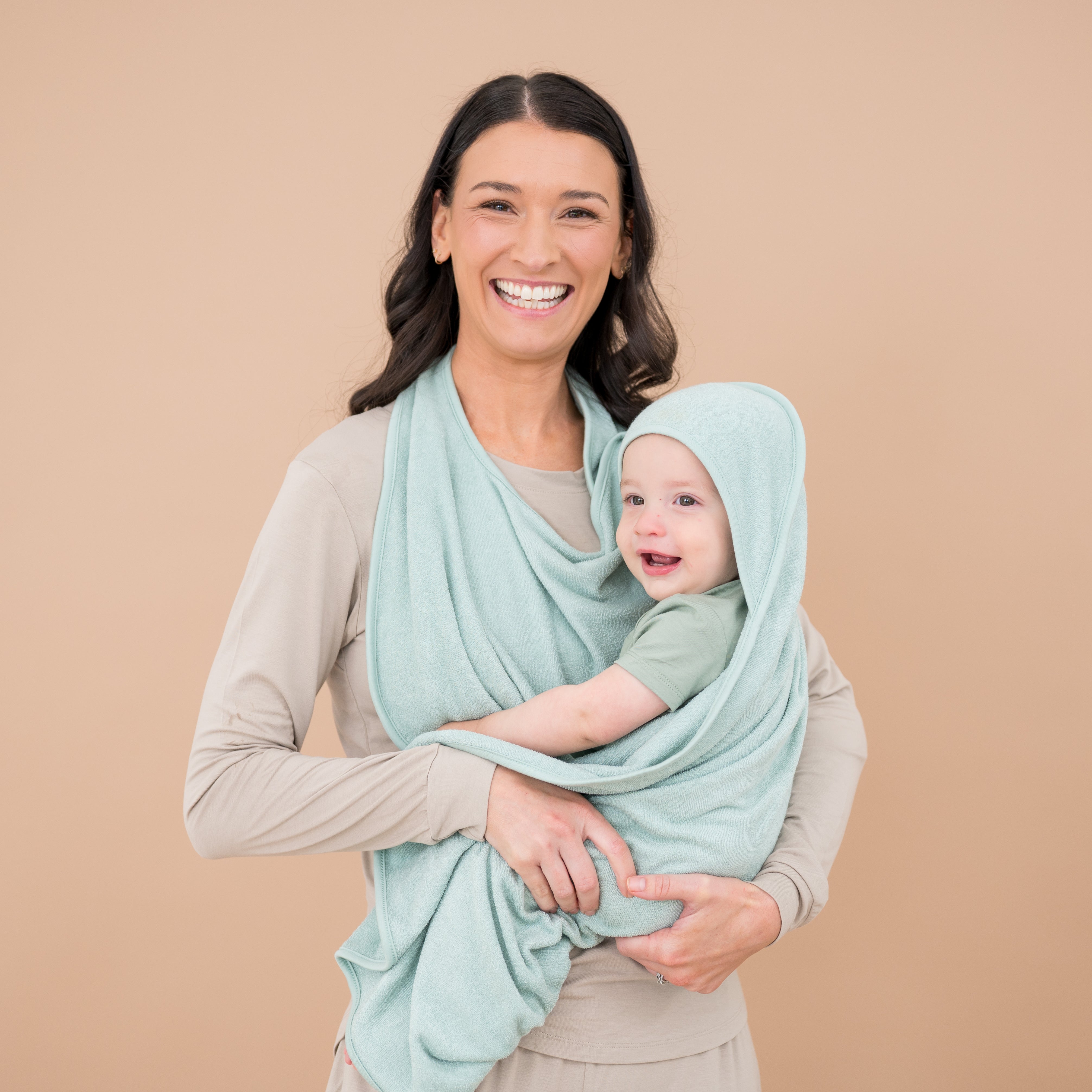 Mom and baby using Terry Apron Towel in Sage green