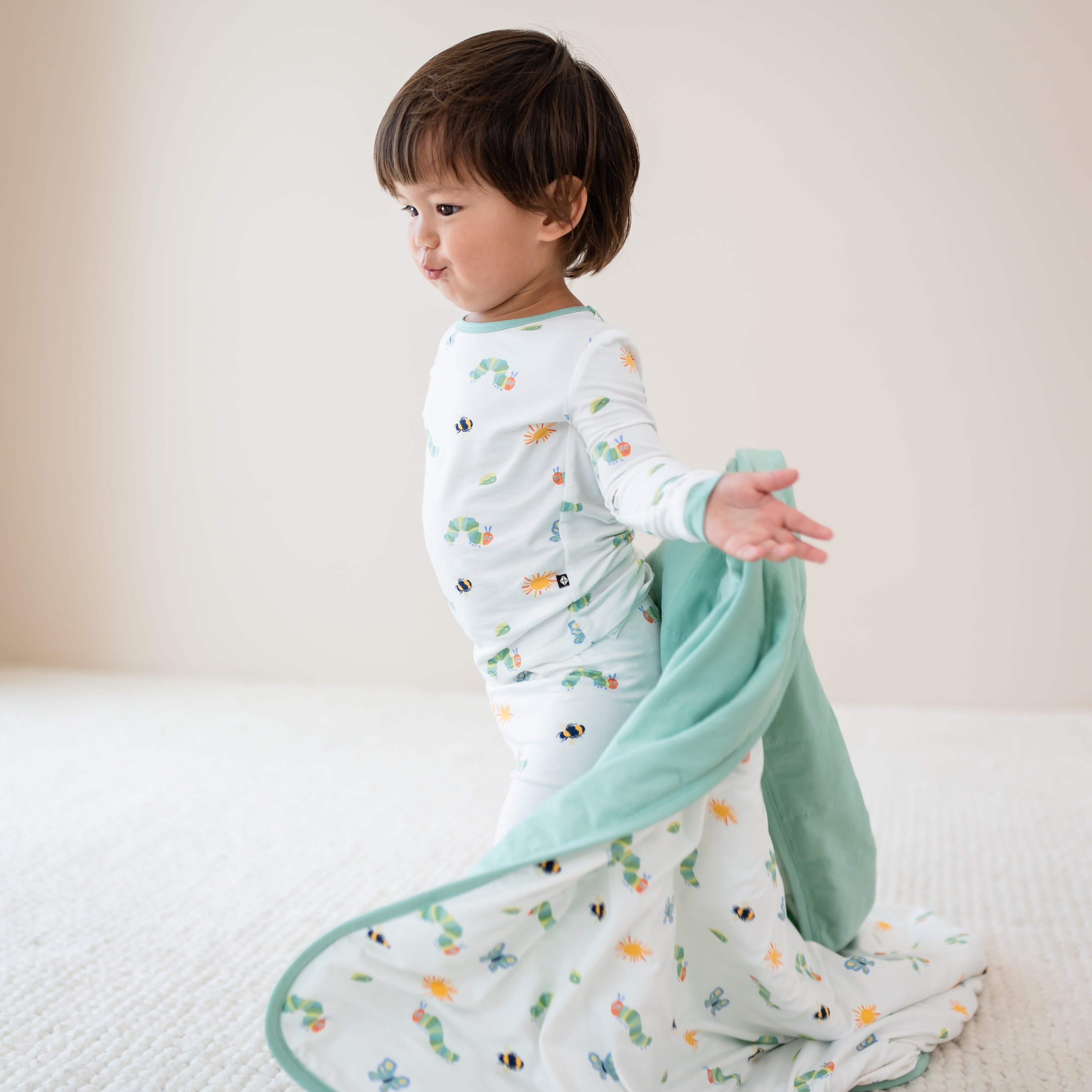 Toddler playing with Toddler Blanket in The Very Hungry Caterpillar™ and Friends 1.0