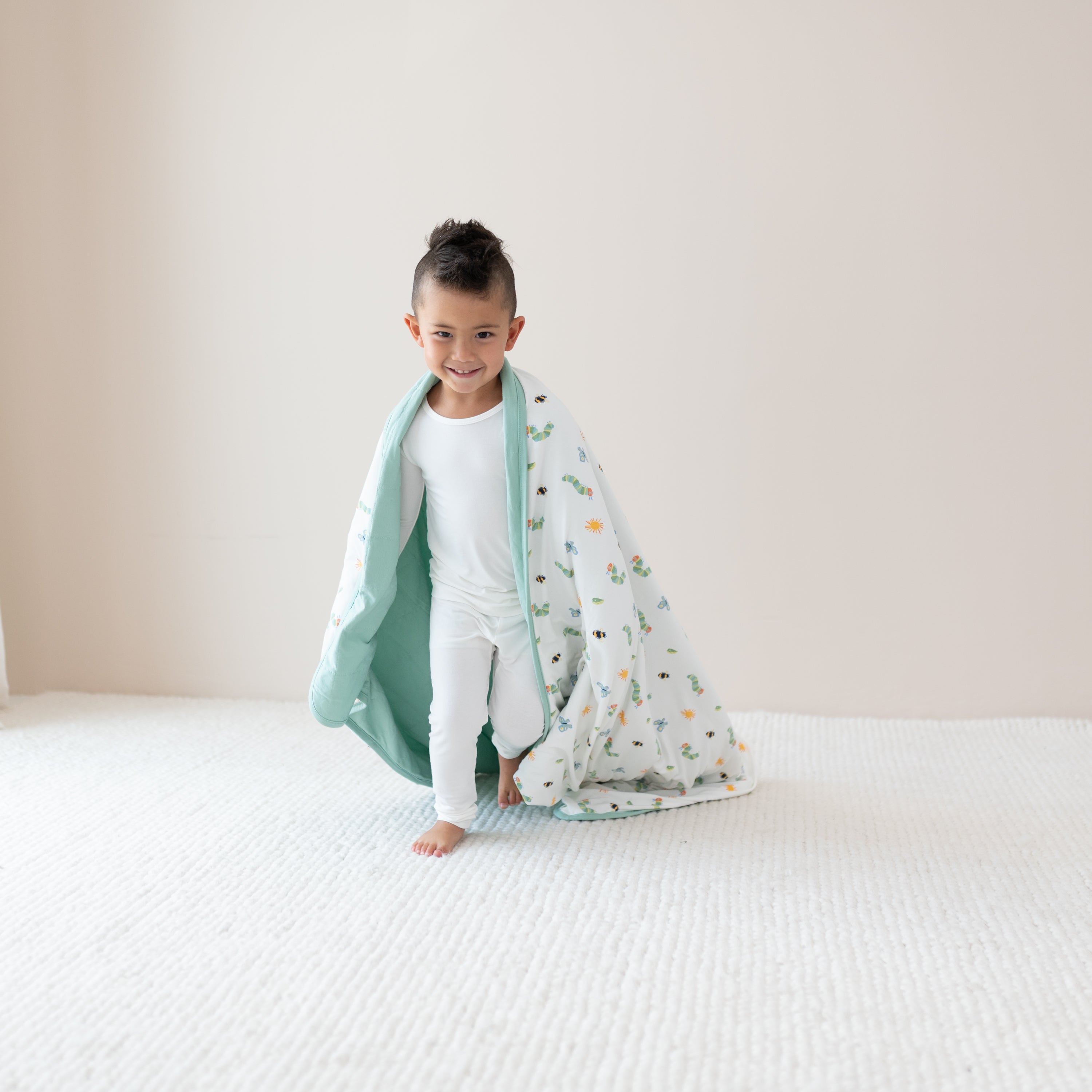 Child running with Youth Blanket in The Very Hungry Caterpillar™ and Friends 2.5