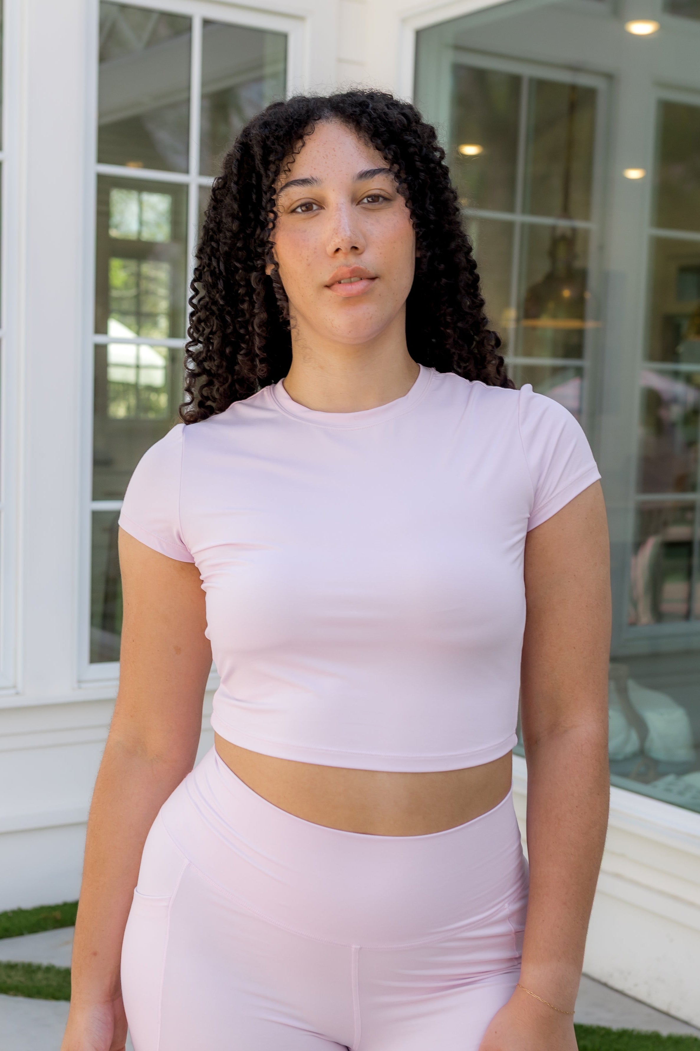 Female modeling the Bamboo Flex Baby Tee in Thistle paired with matching shorts