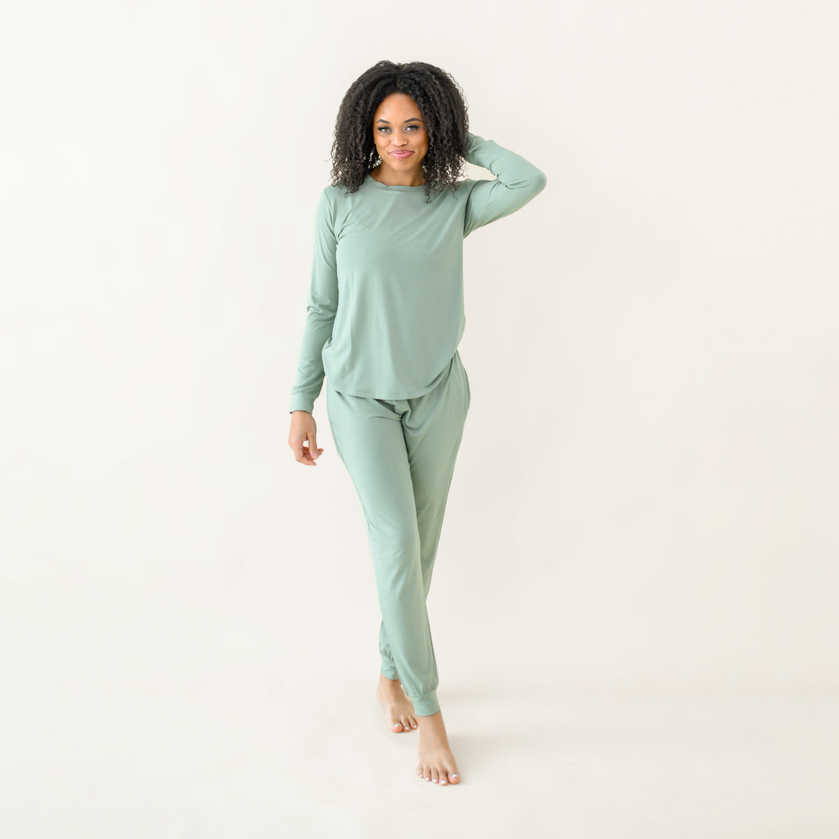 Woman modeling Women's Jogger Pajama Set in Thyme