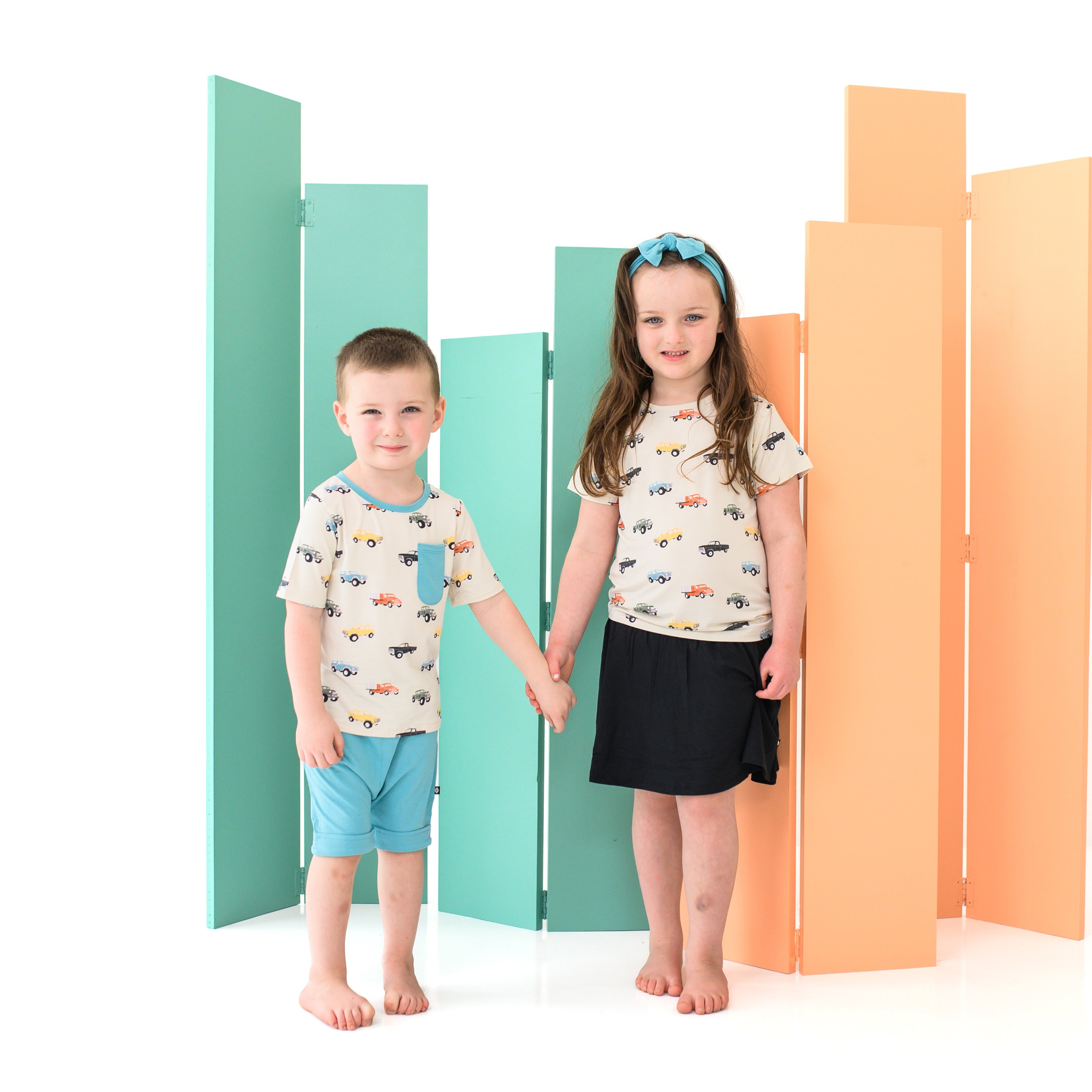 Kids wearing Toddler tees in Vintage Truck Pattern