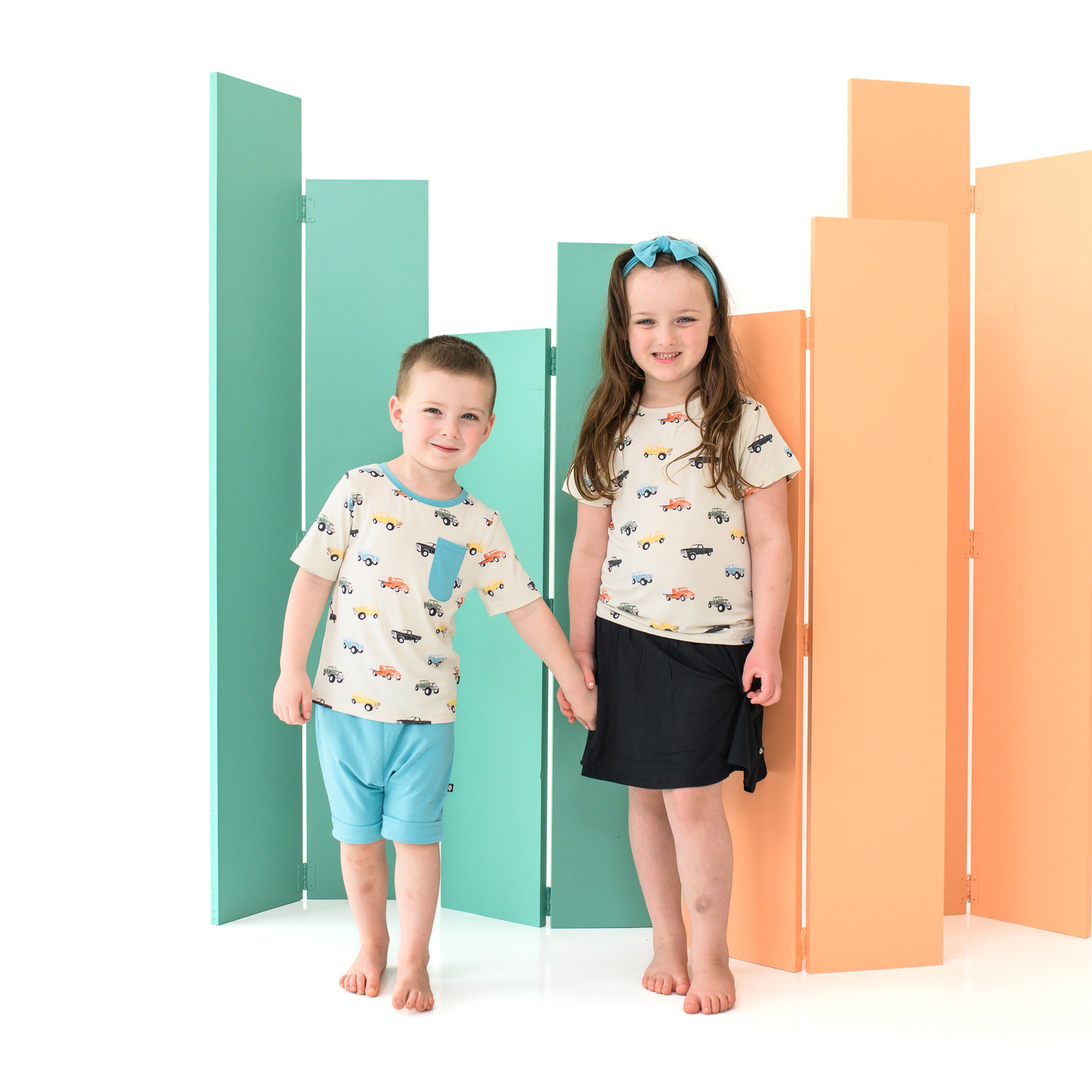 Kids wearing matching Vintage Truck toddler tees