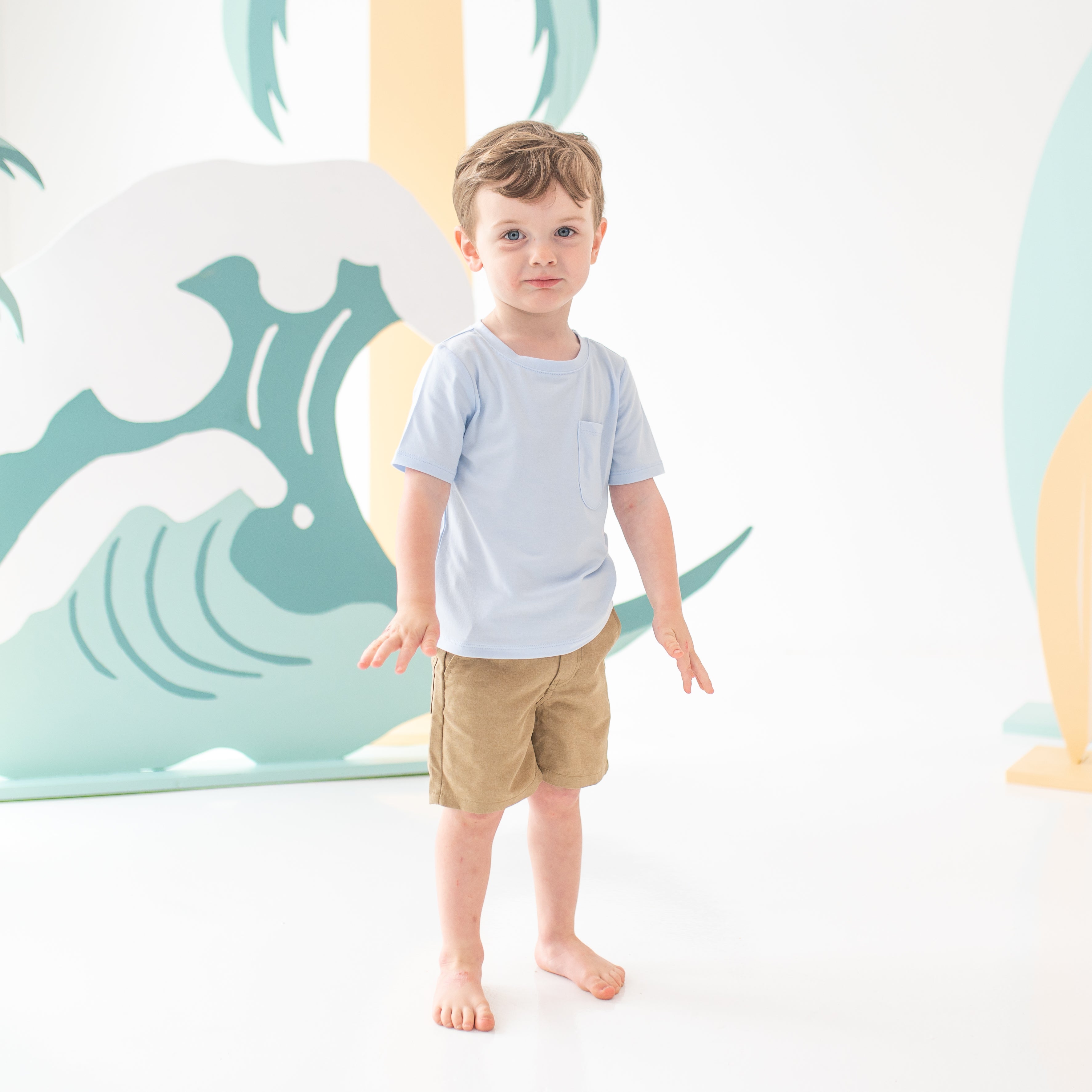 Child model wearing the Toddler Crew Neck Tee in Mist