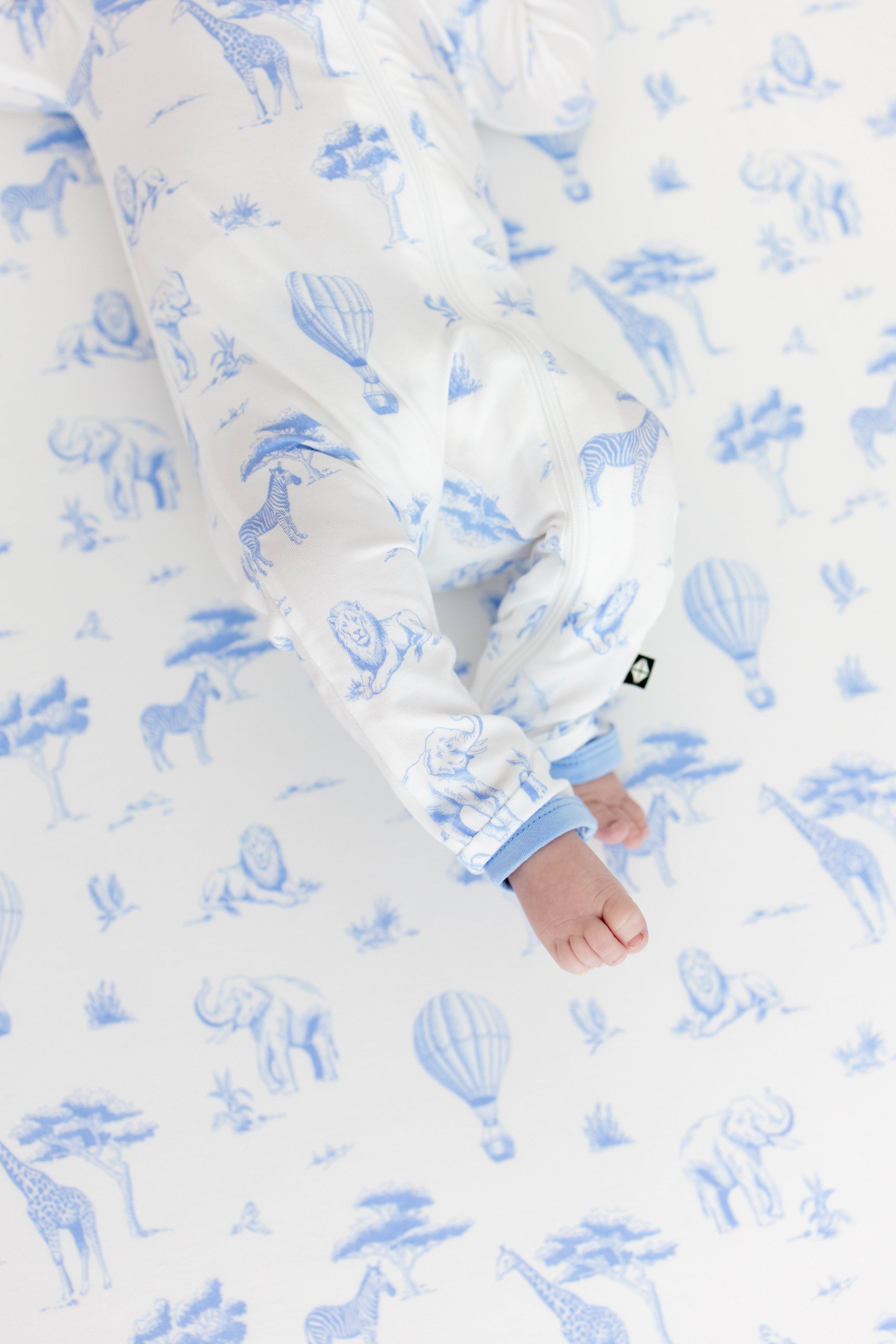 The zipper closure on the leg of the Zippered Romper in Toile Safari