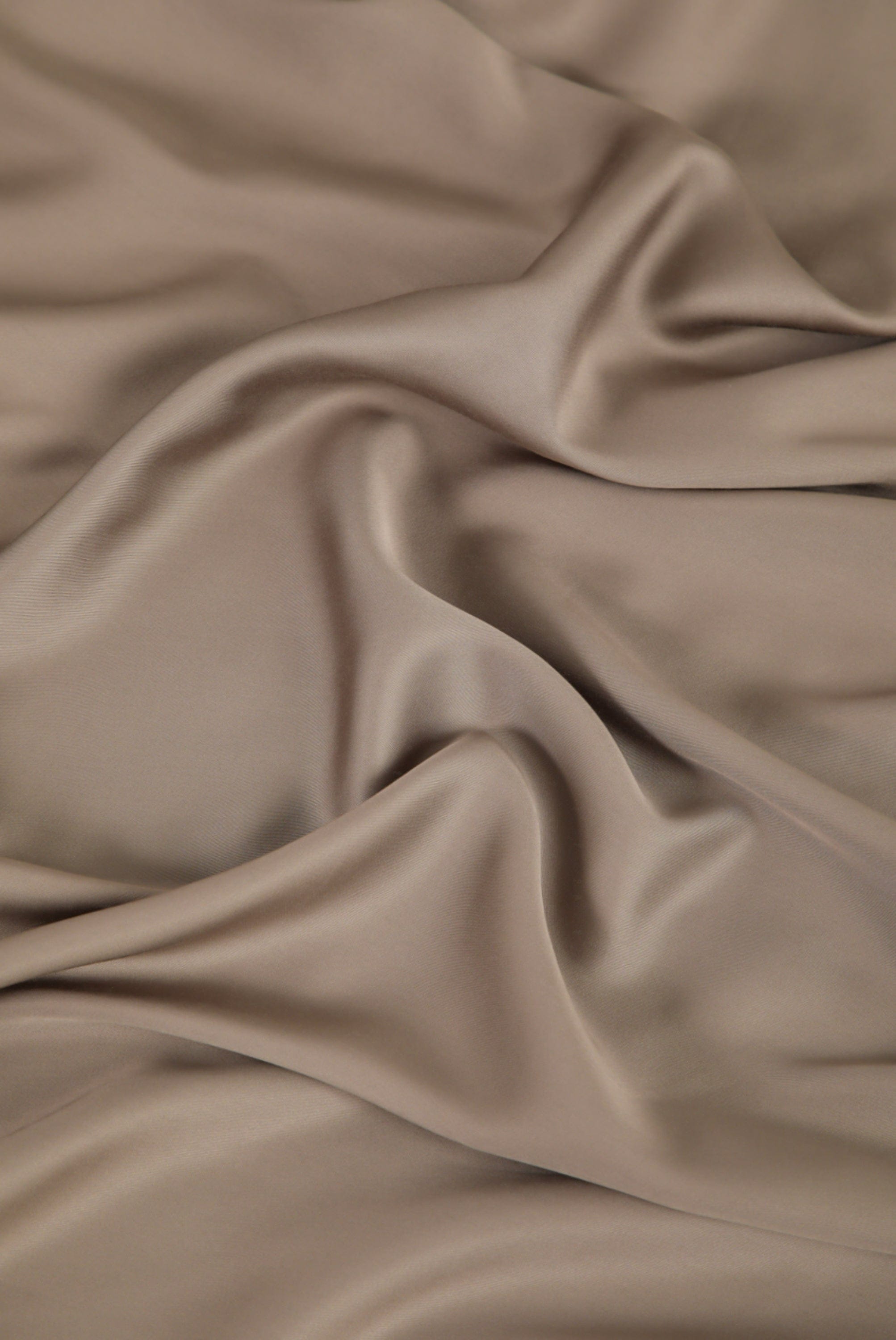 Close up of the Bamboo Sateen Sheet Set in Truffle fabric