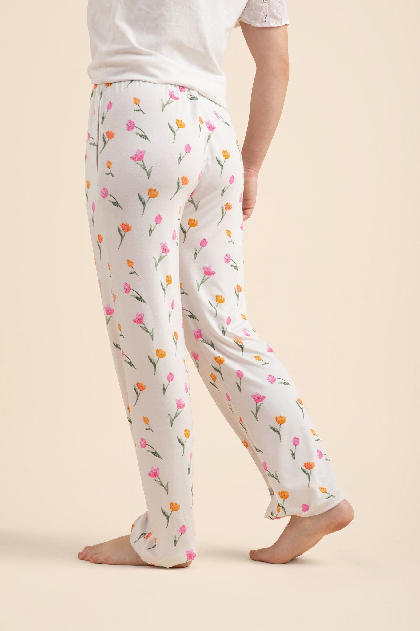 Female modeling the back of the Women's Lounge Pants in Tulip
