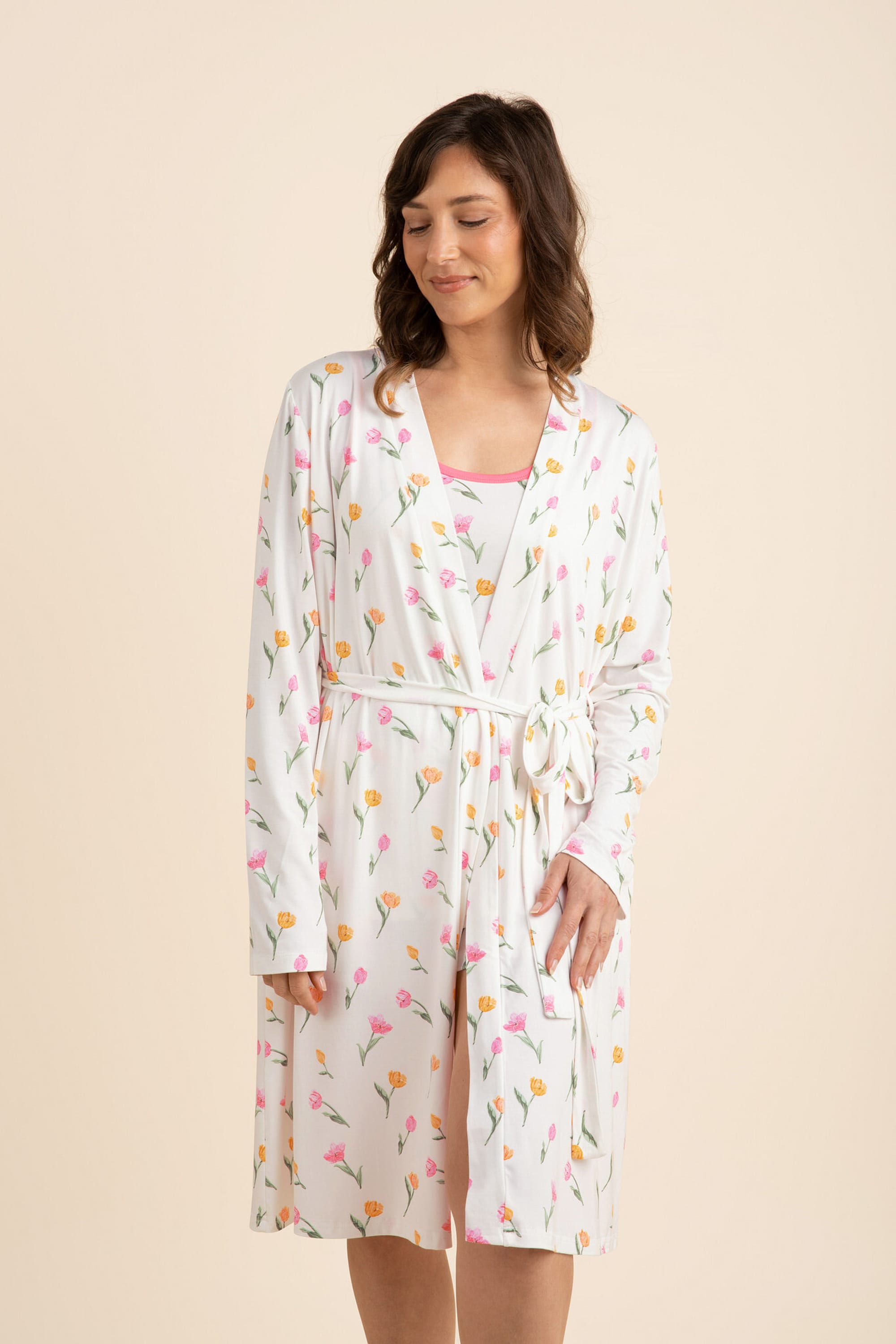 Female modeling the Women's Lounge Robe in Tulip with matching pajamas on underneath