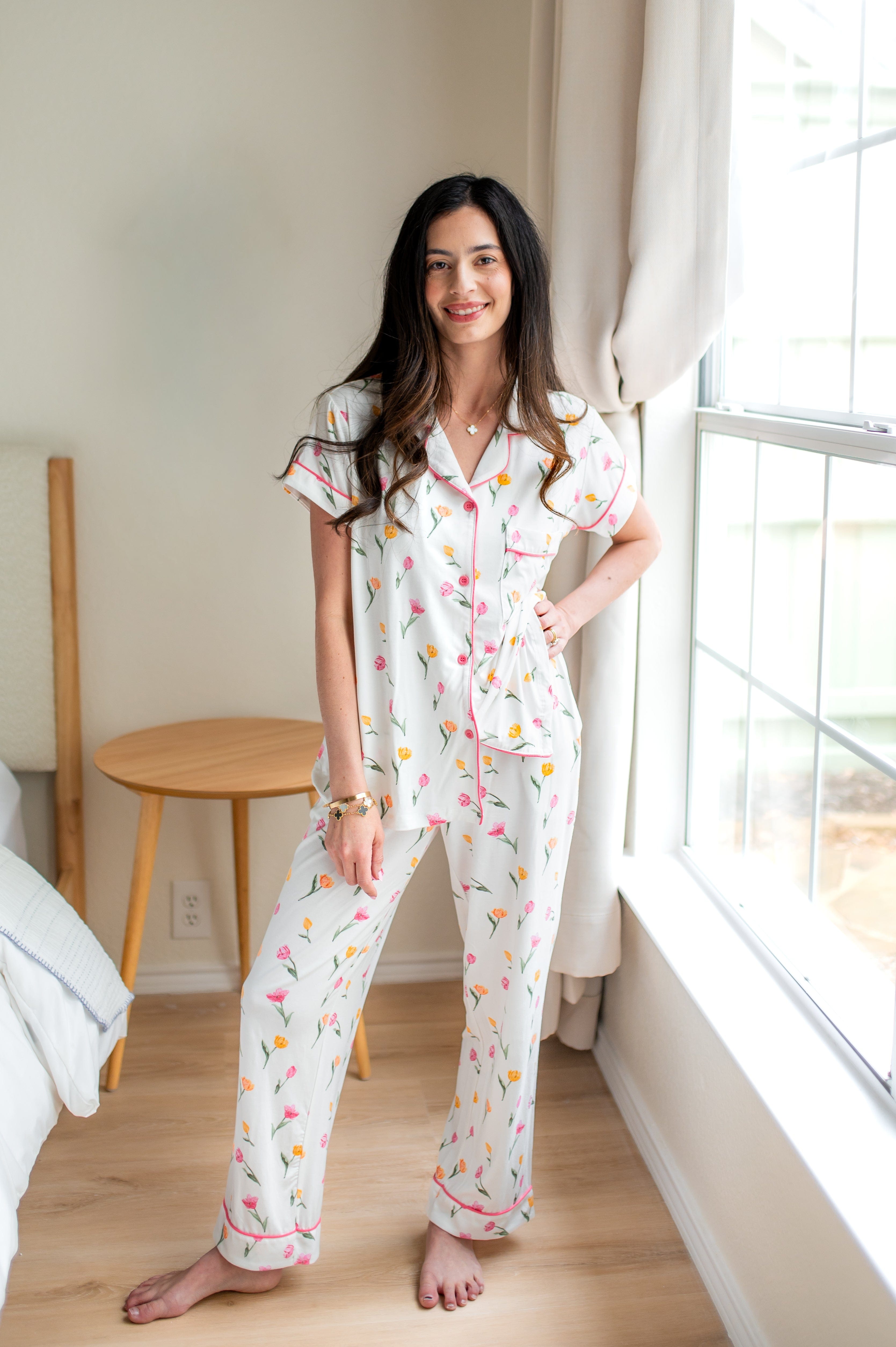 Female model posing wearing the Women's Short Sleeve Cropped Pajama Set in Tulip