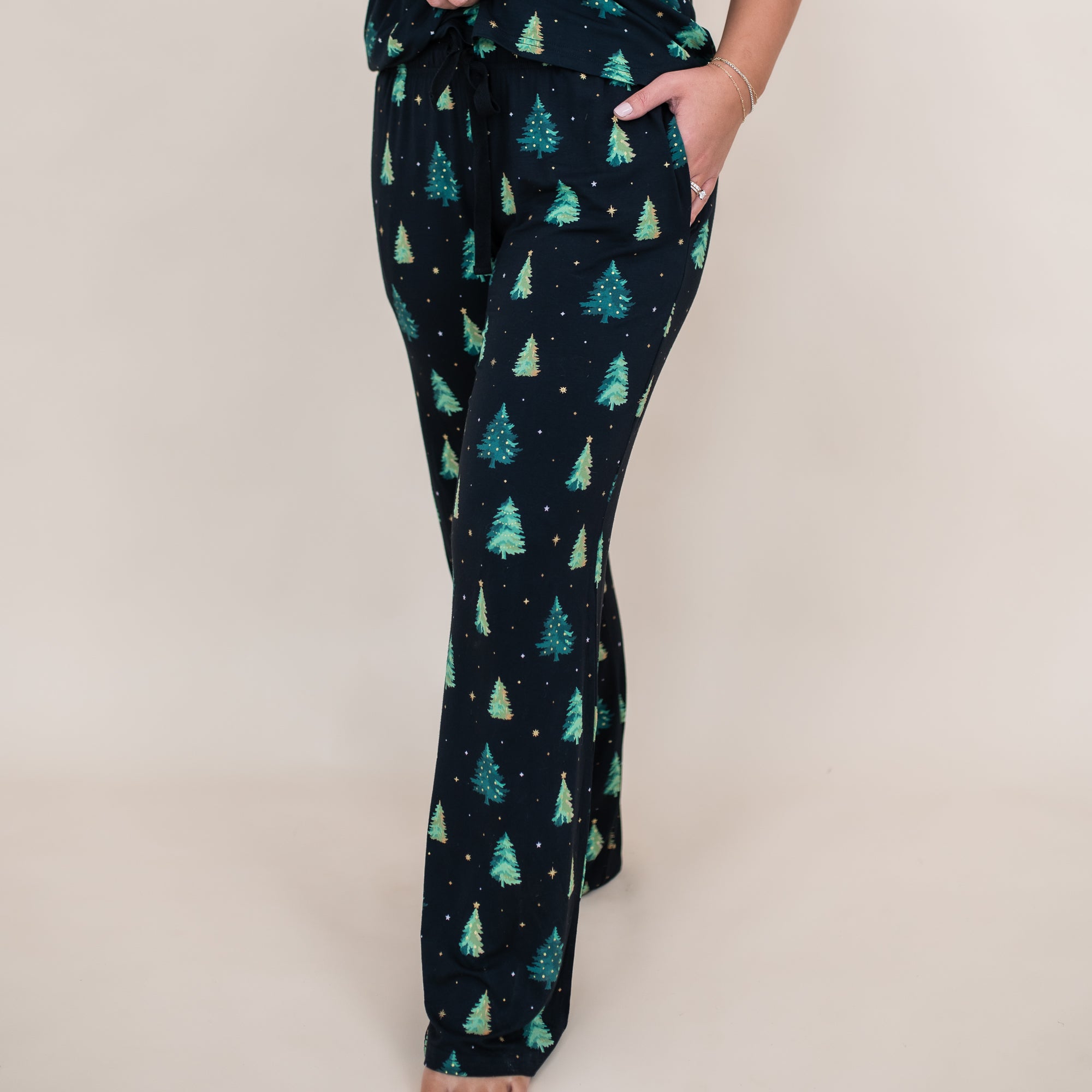 Close up of the Women's Lounge Pants in Twinkle Tree shown on a female model