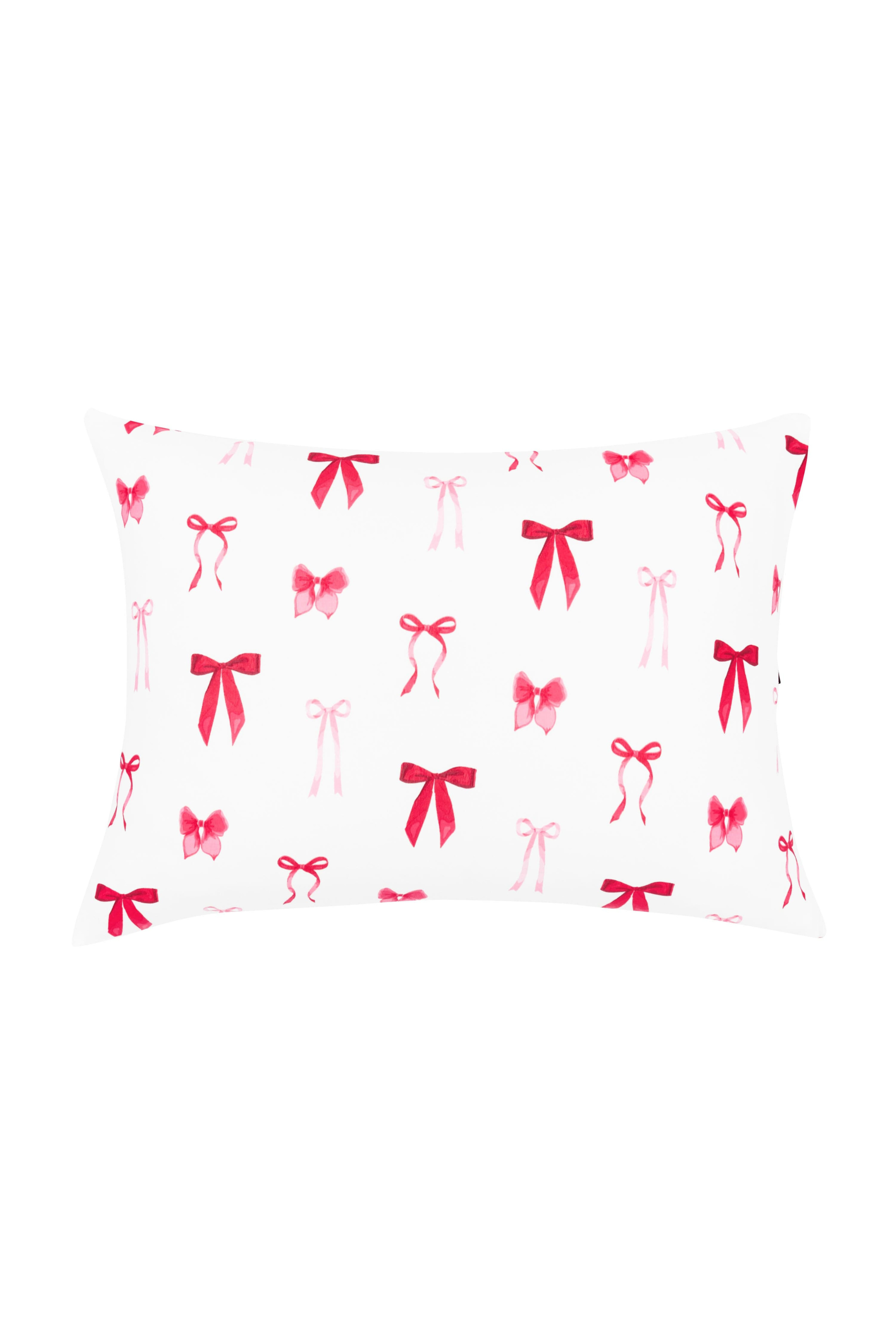 Pillowcase with red bow pattern on a white background