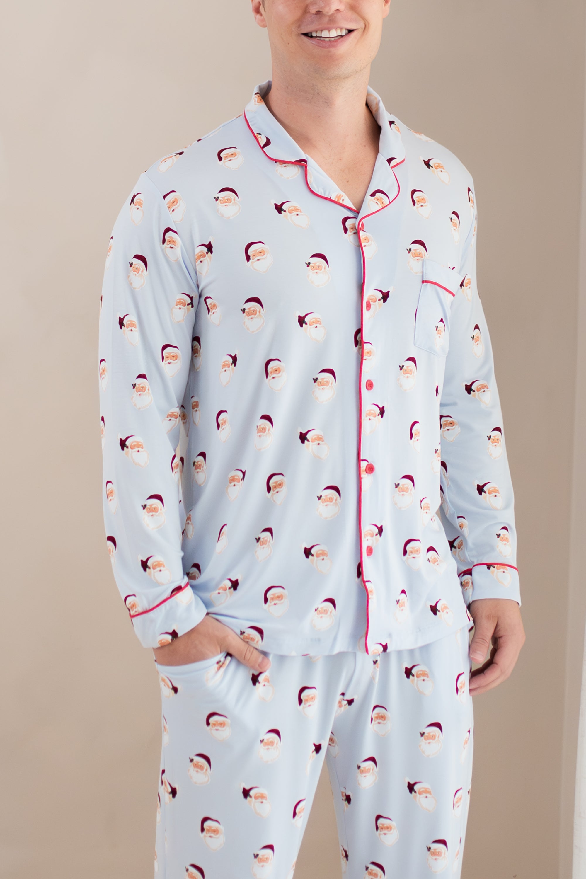 Close up of the Men's Long Sleeve Pajama Set in Vintage Santa shown on a male model