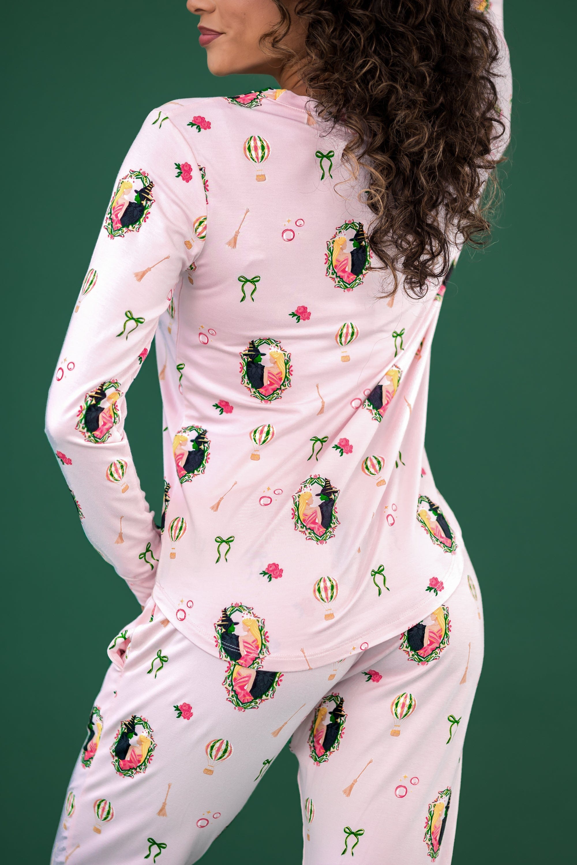 Model wearing the Women's Jogger Pajama Set in Wicked with her back to the camera