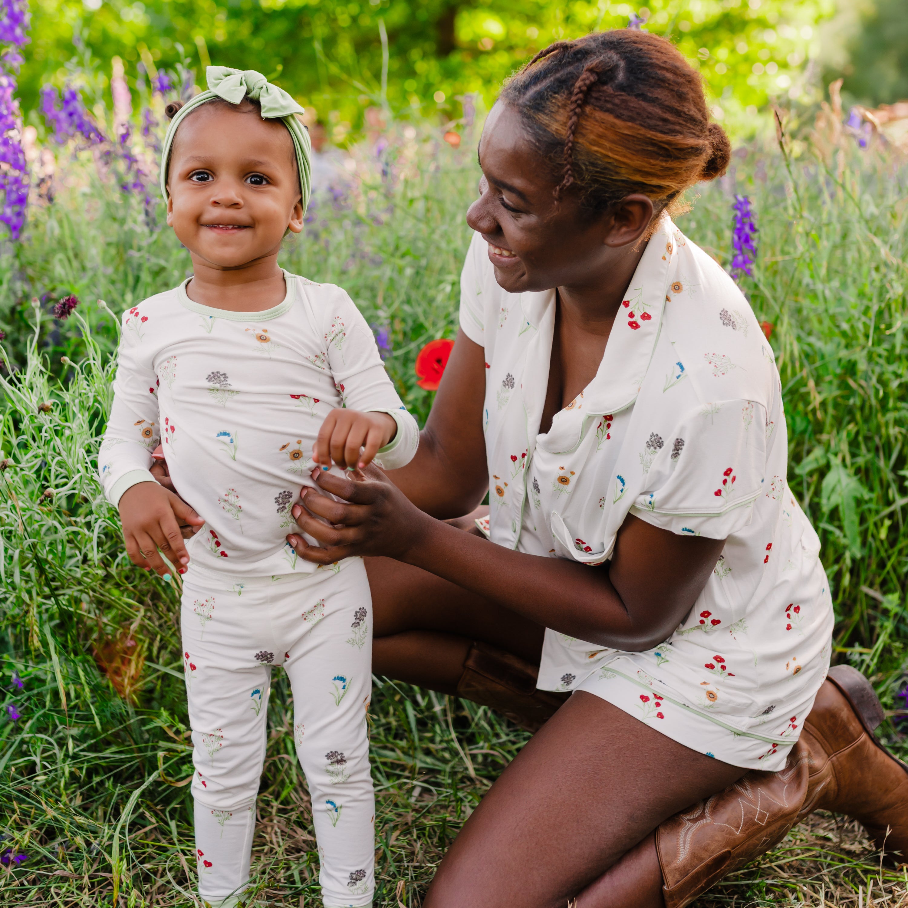 Toddler in Long Sleeve Pajamas in Wildflower with mom in matching pajamas