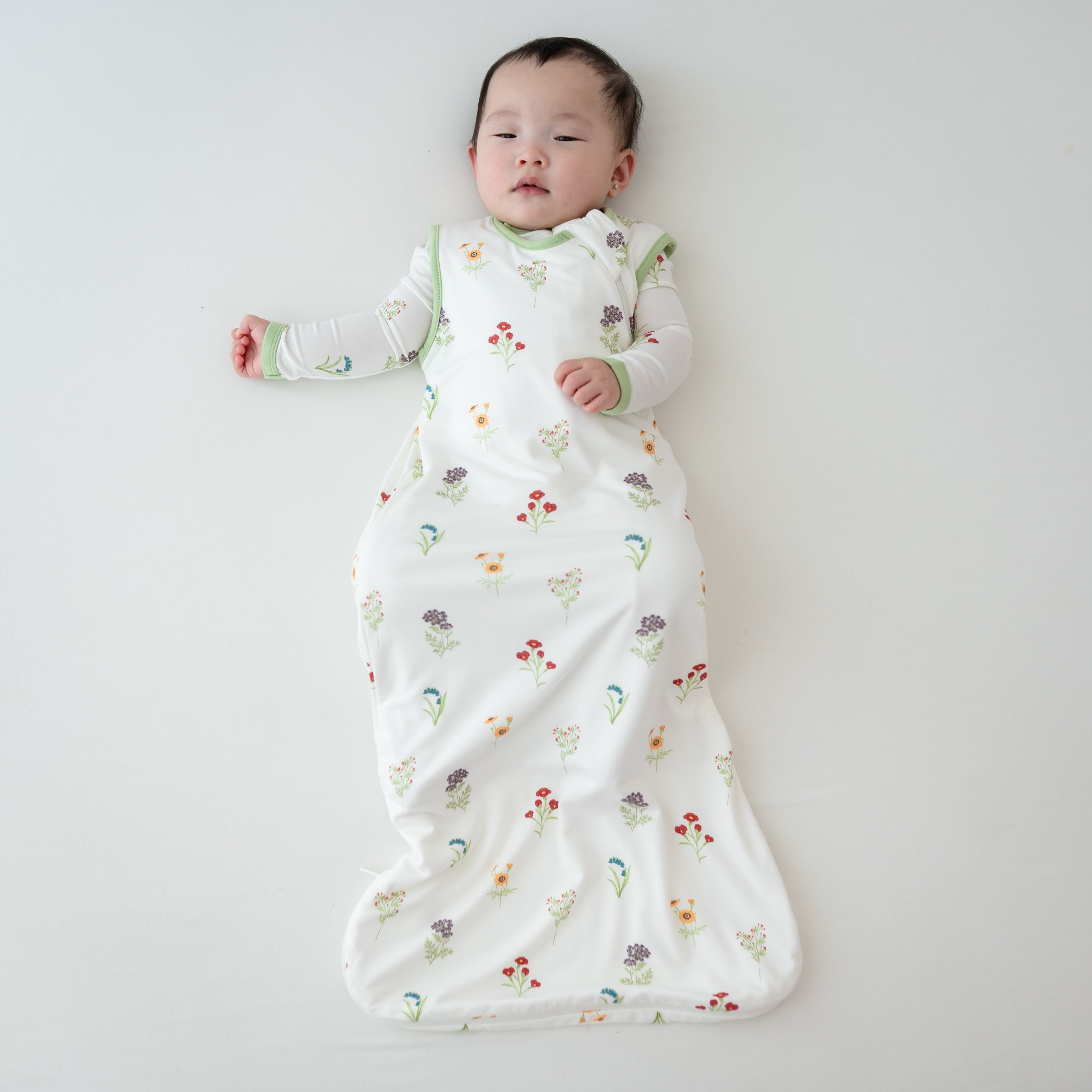 Sleepy Baby wearing Sleep Bag in Wildflower 0.5