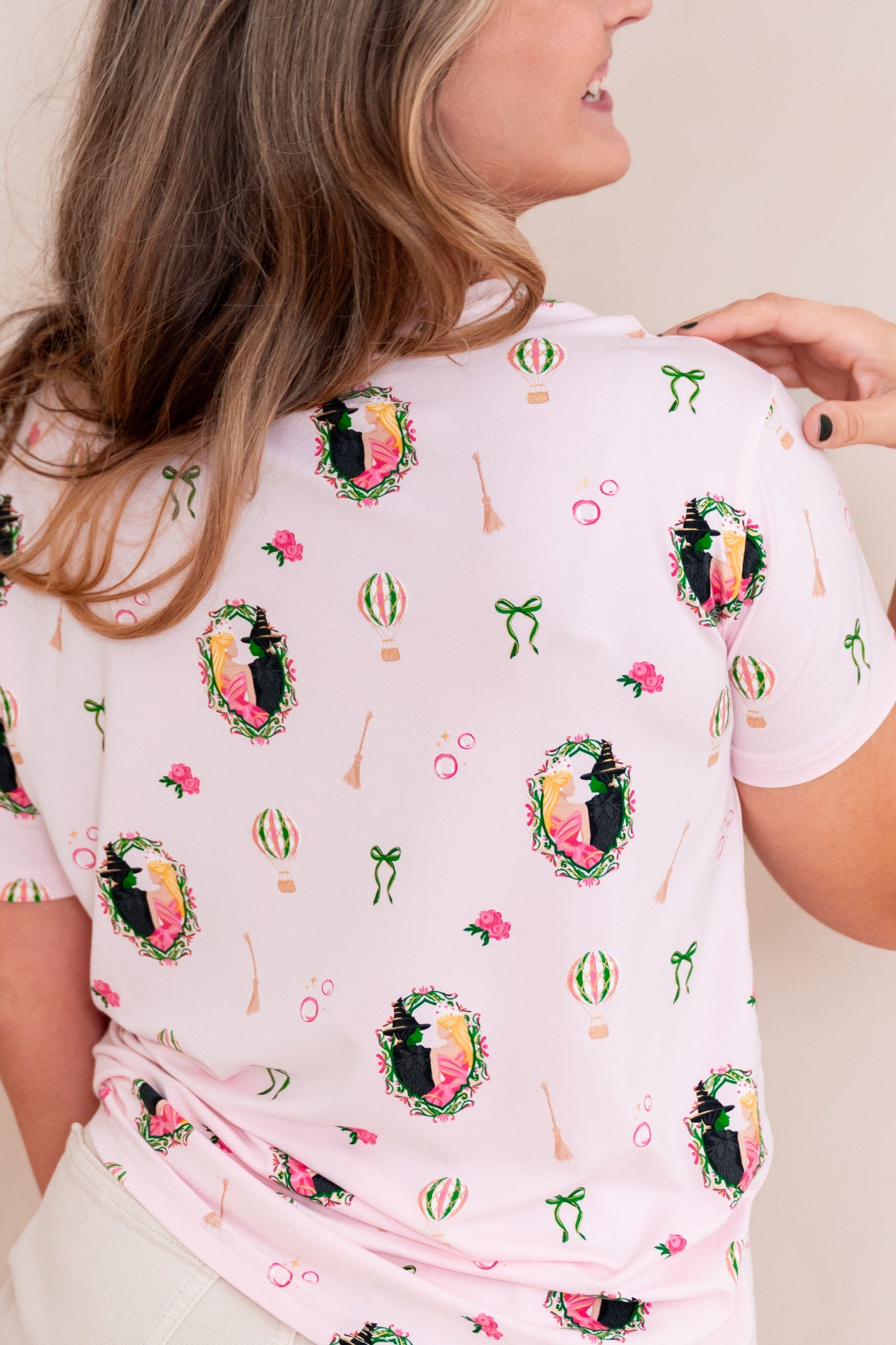 The back of the Women's Relaxed Fit V-Neck in Wicked shown on a model