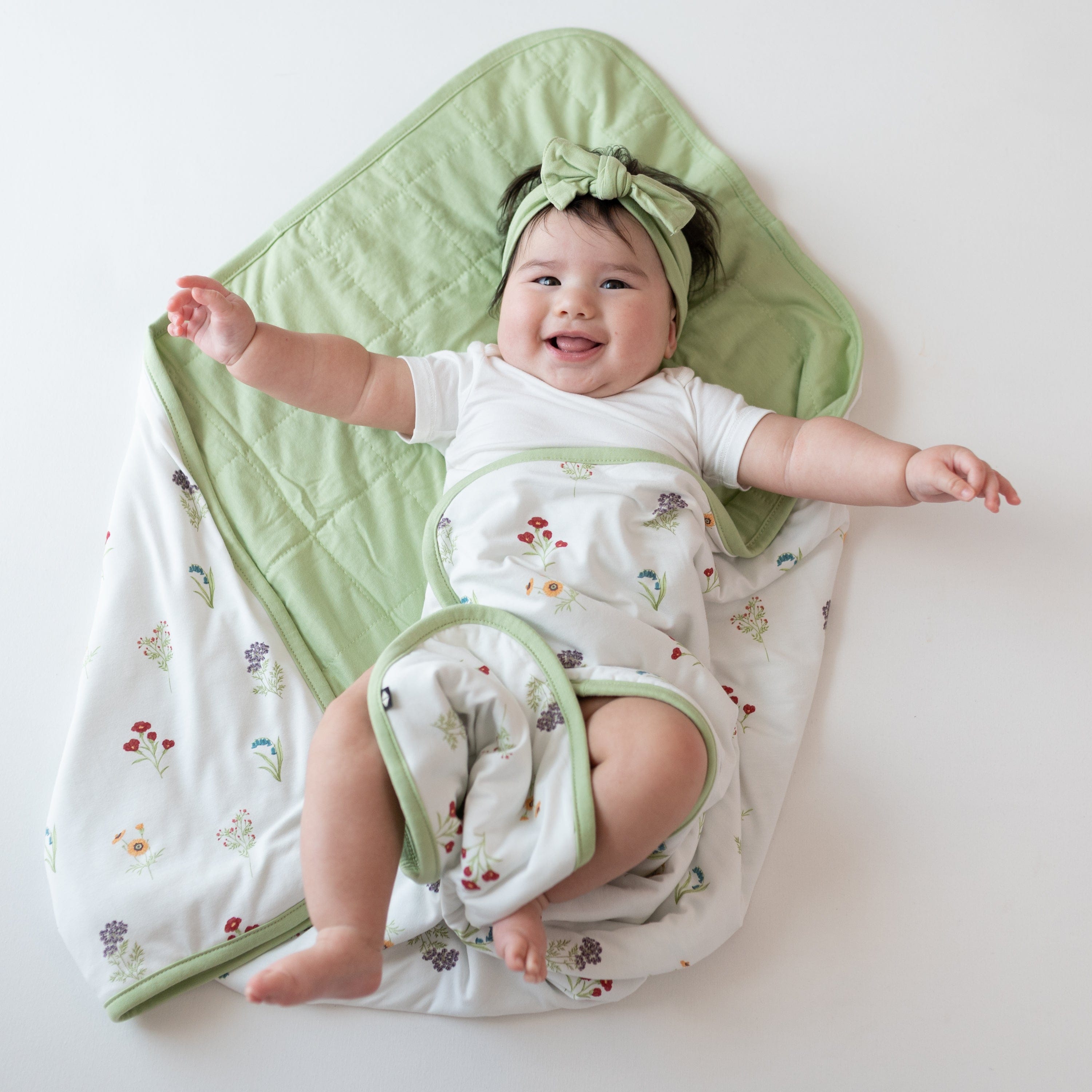 Baby wrapped in Baby Blanket in Wildflower 1.0