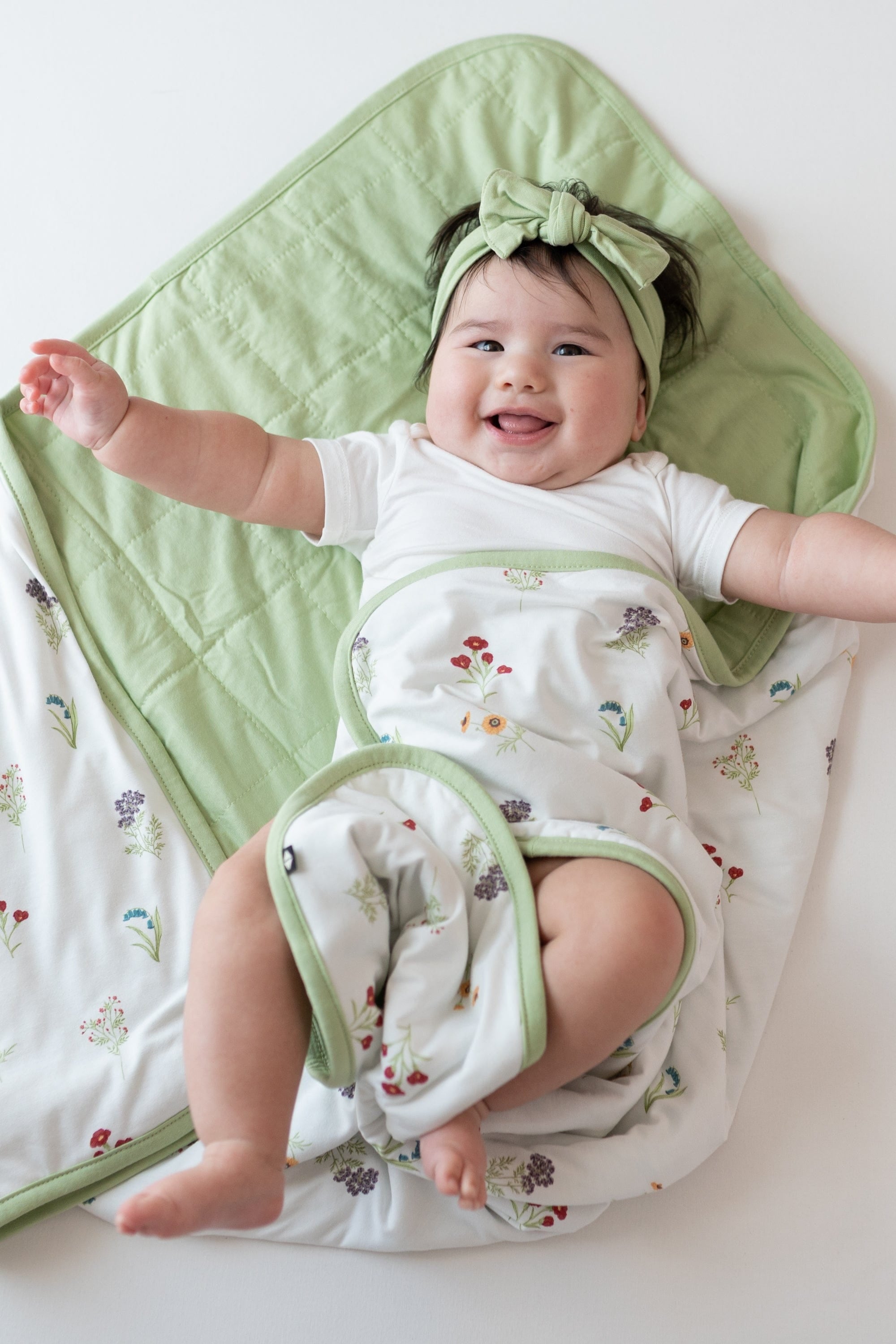 Baby wrapped in Baby Blanket in Wildflower 1.0