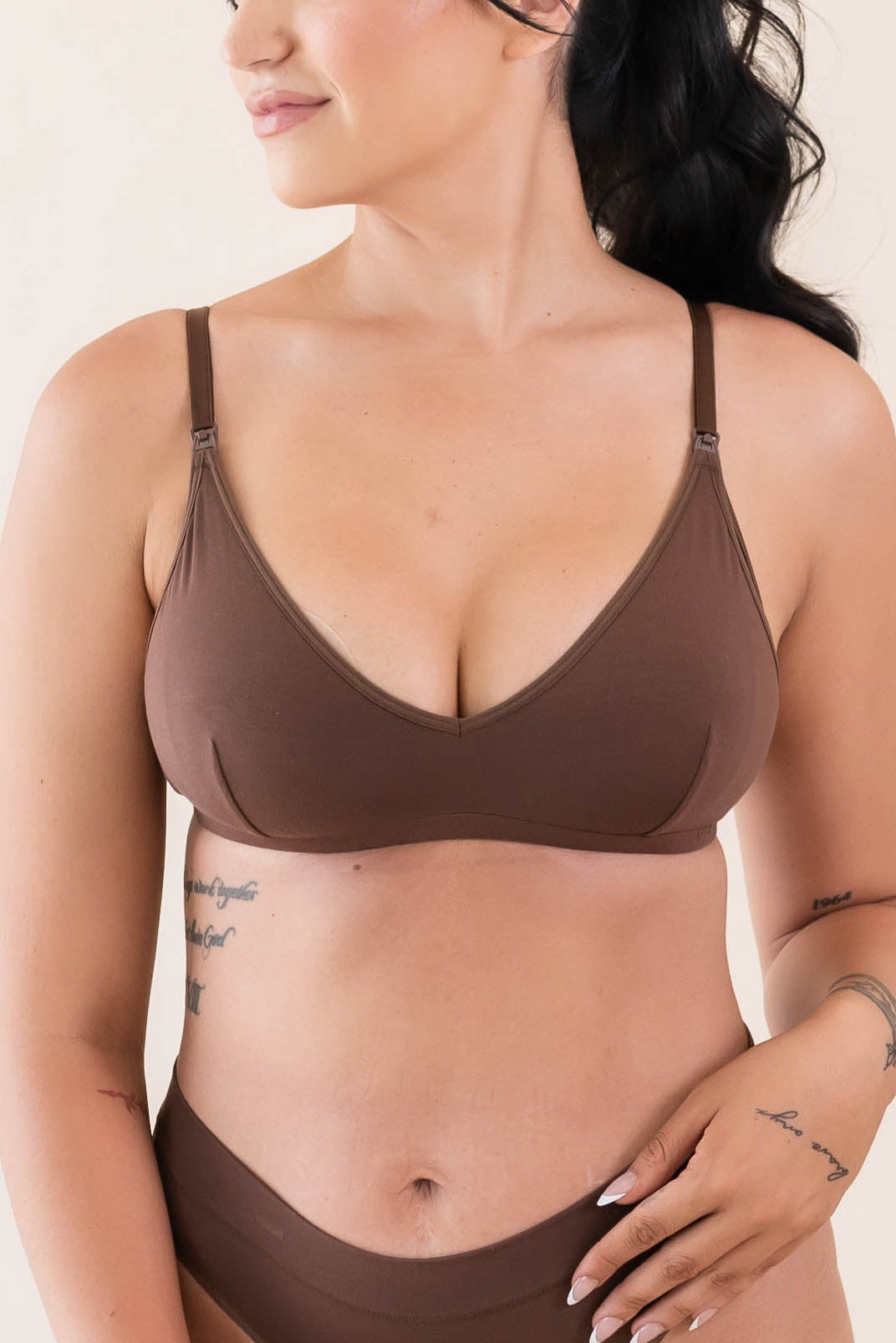 Female modeling the Women's Nursing Bra in Latte with matching underwear
