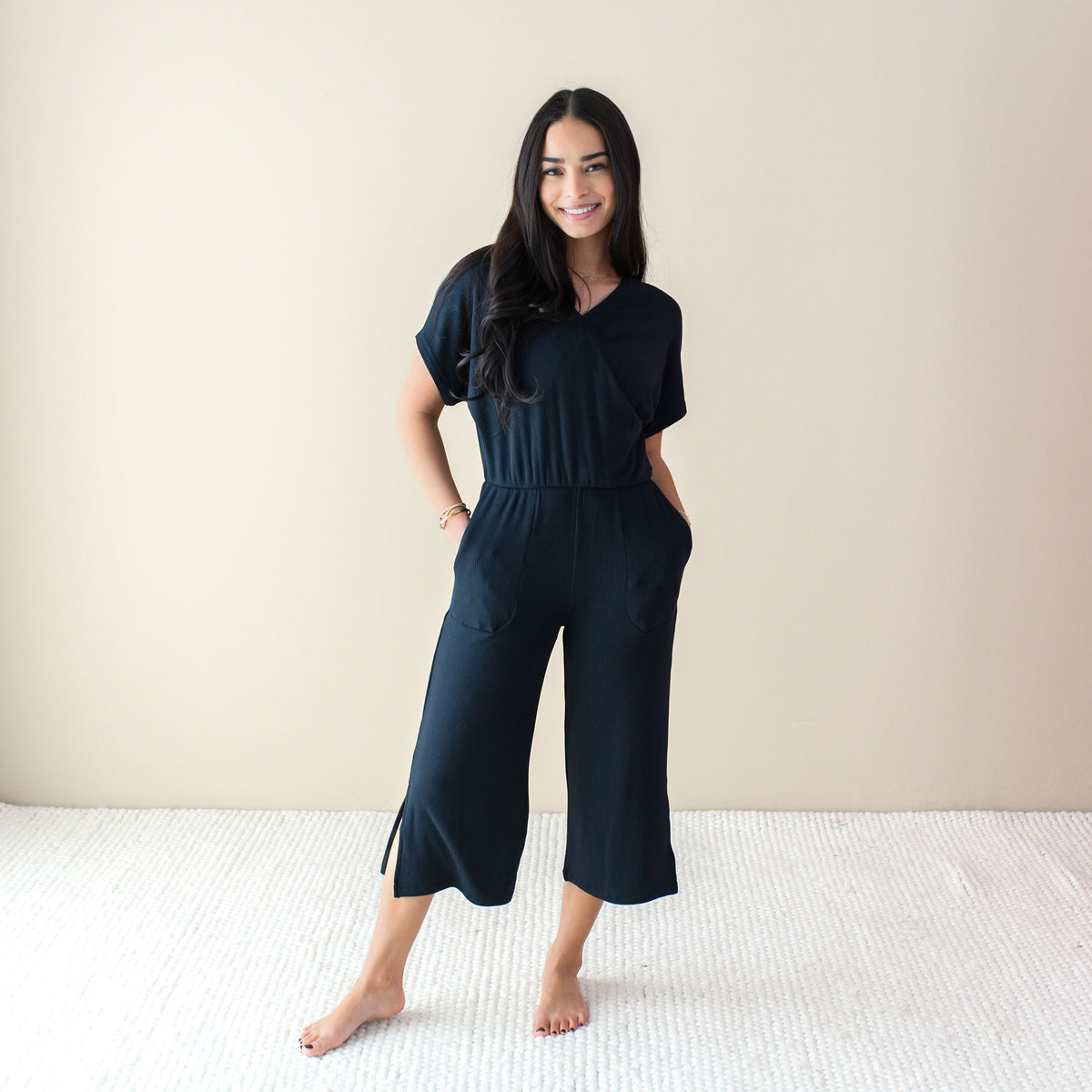 Woman wearing Women's Ribbed Jumpsuit in Midnight